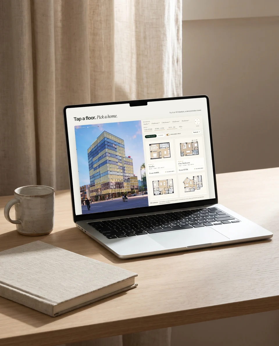 101 Madison on a laptop, embedded in a website (illustrative scene; the screen is the live demo)