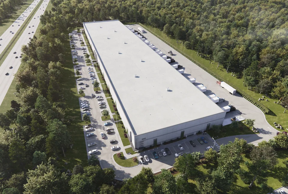 Aerial of a long distribution building with parking and truck court at Hinton Oaks Industrial Park – 540 Hinton Oaks Blvd, Knightdale