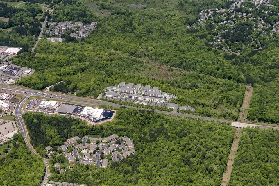 Aerial of the Oakridge residential plan in Durham, NC, with housing clusters in forest