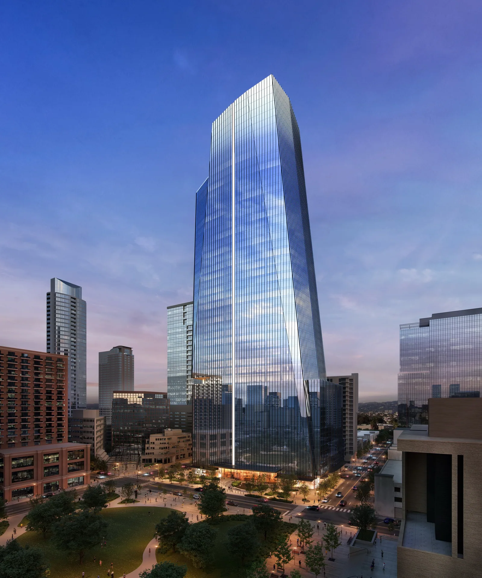 Tapering glass tower The Republic over Republic Square Park in downtown Austin at dusk