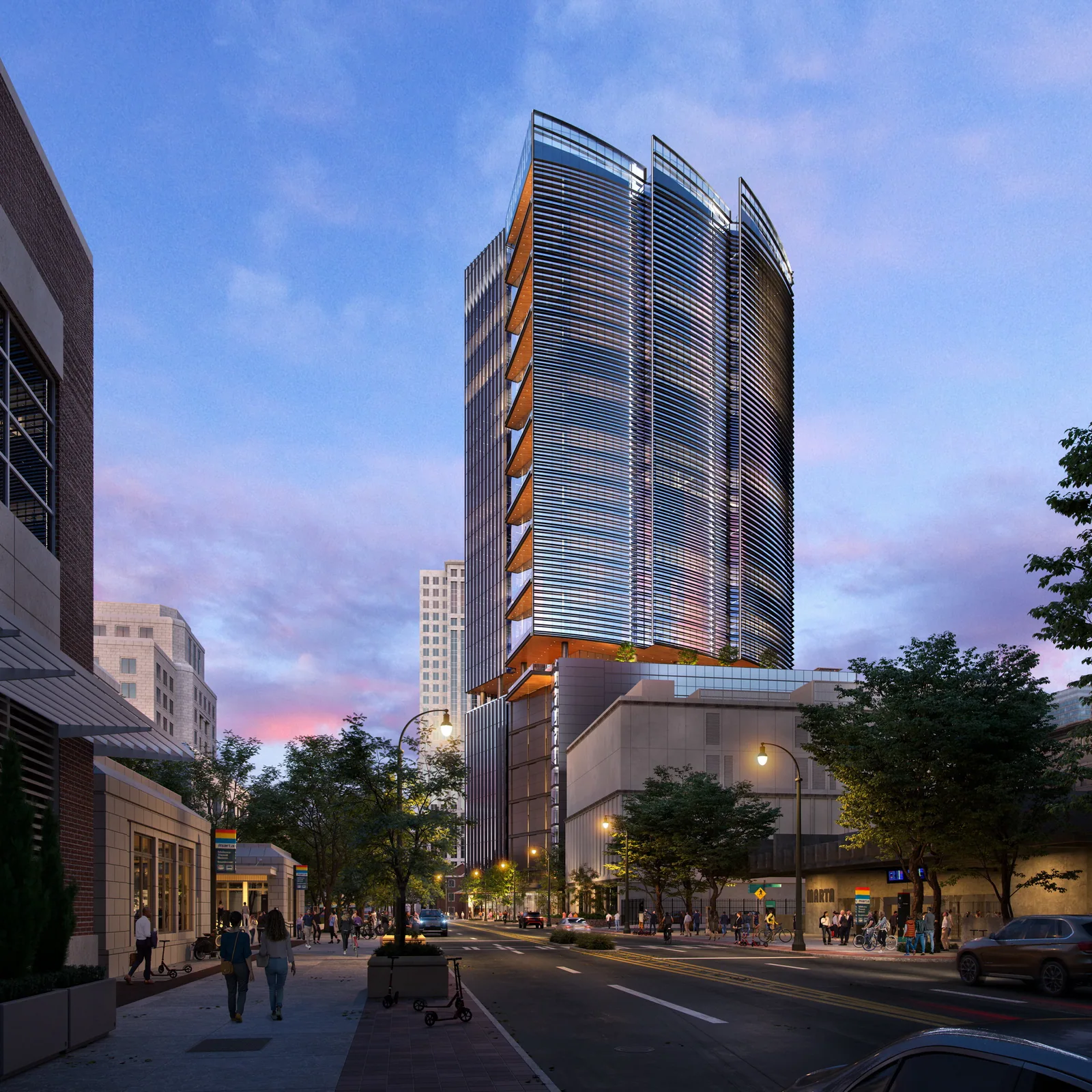 Glass office tower with copper-toned accents at Stratus Midtown in Atlanta at dusk