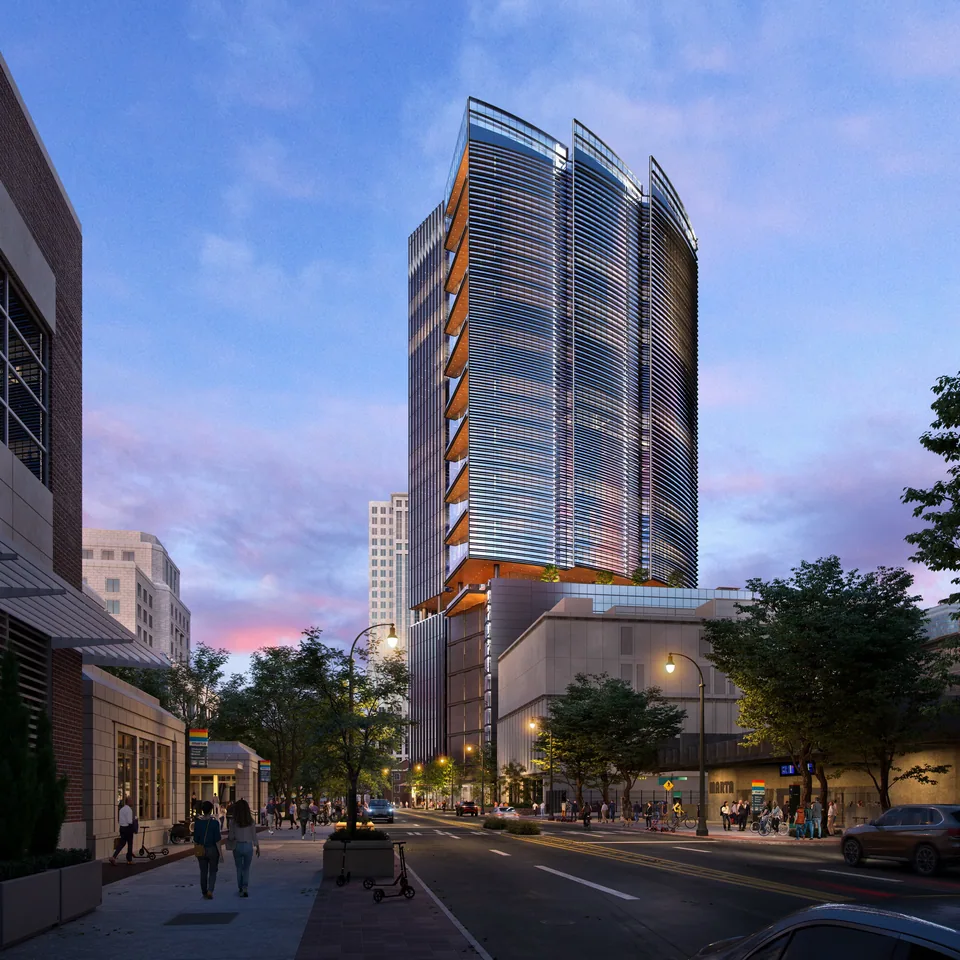 Glass office tower with copper-toned accents at Stratus Midtown in Atlanta at dusk