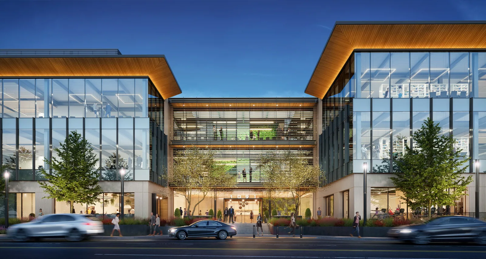 Two glass lab buildings joined by a bridge under wood-lined roof overhangs at Brittan West, San Carlos