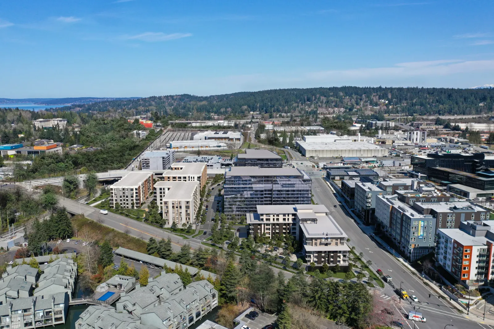 Aerial of the 12th Place Development in Bellevue with new office and residential blocks beside the freeway