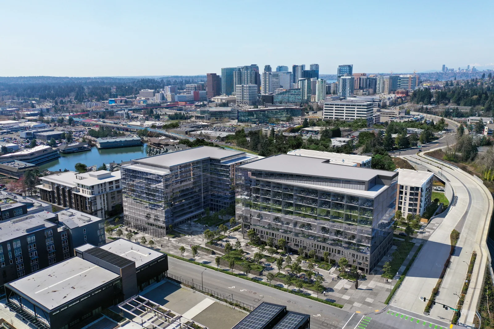 Aerial of the 12th Street office buildings and courtyard in Bellevue with downtown towers behind