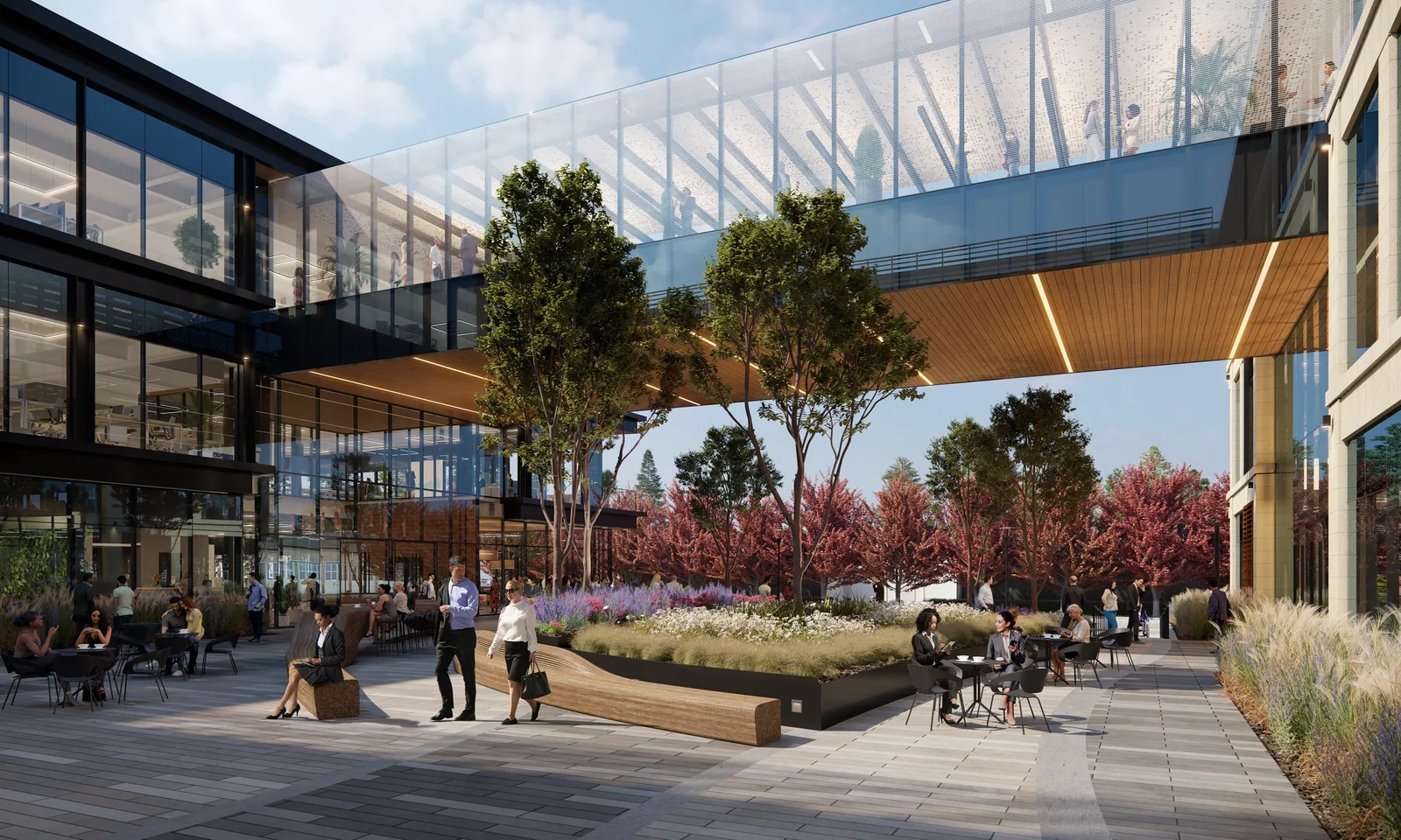 Courtyard under the glass bridge at 1021 Howard Avenue, San Carlos, with trees, benches and planters