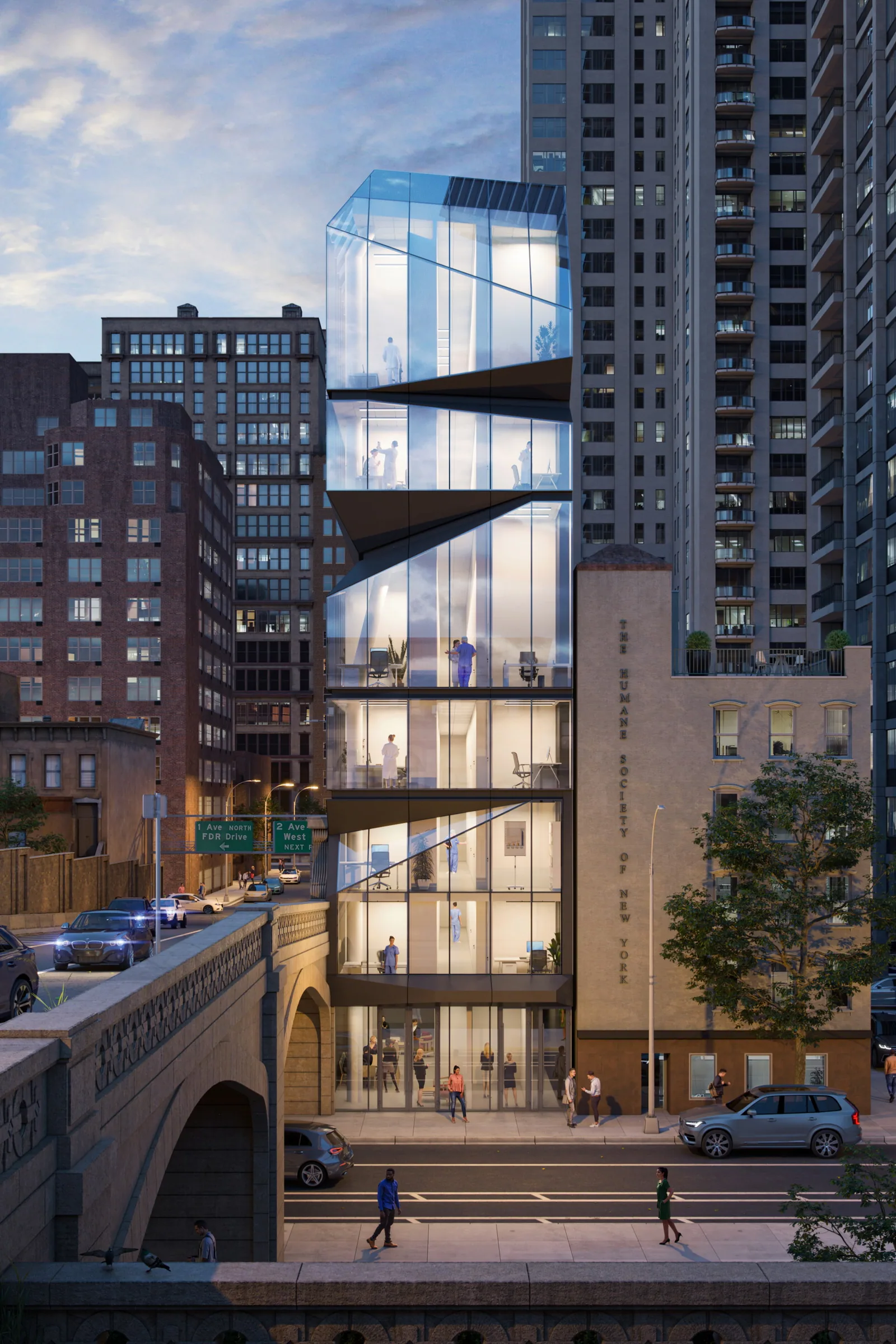 E59 Midtown Medical at 308 East 59th Street, New York, at dusk with cantilevered floors over the street