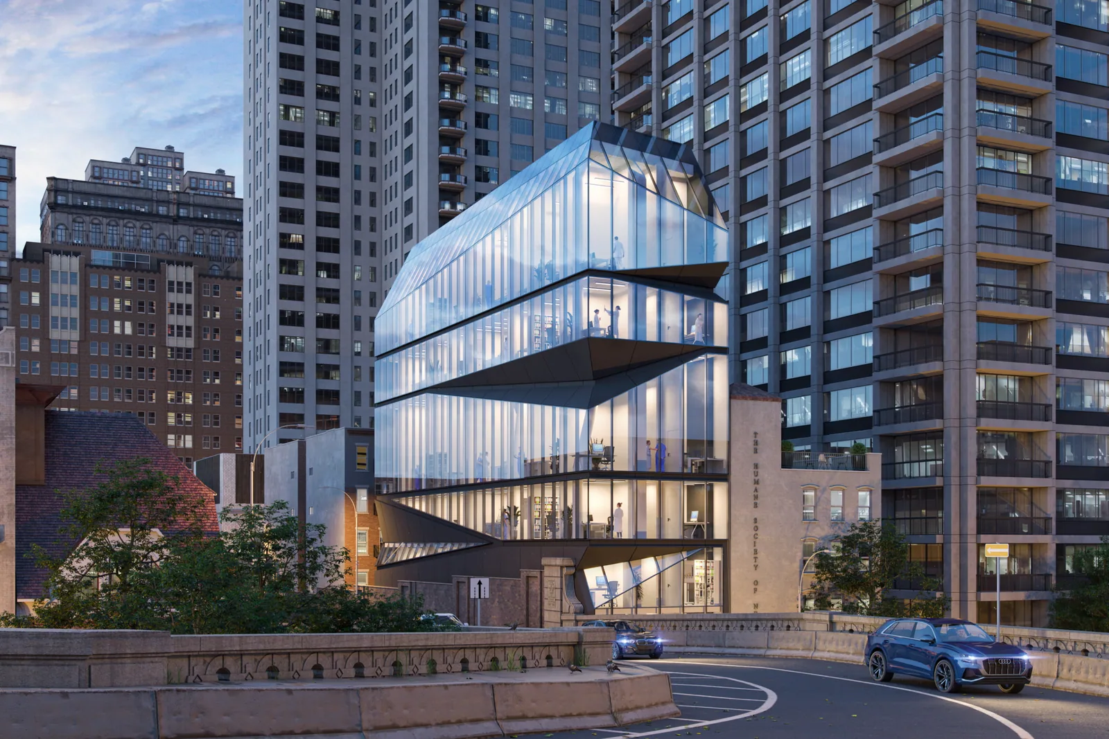 Stacked glass floors of E59 Midtown Medical at 308 East 59th Street at blue hour beside the Queensboro Bridge ramp