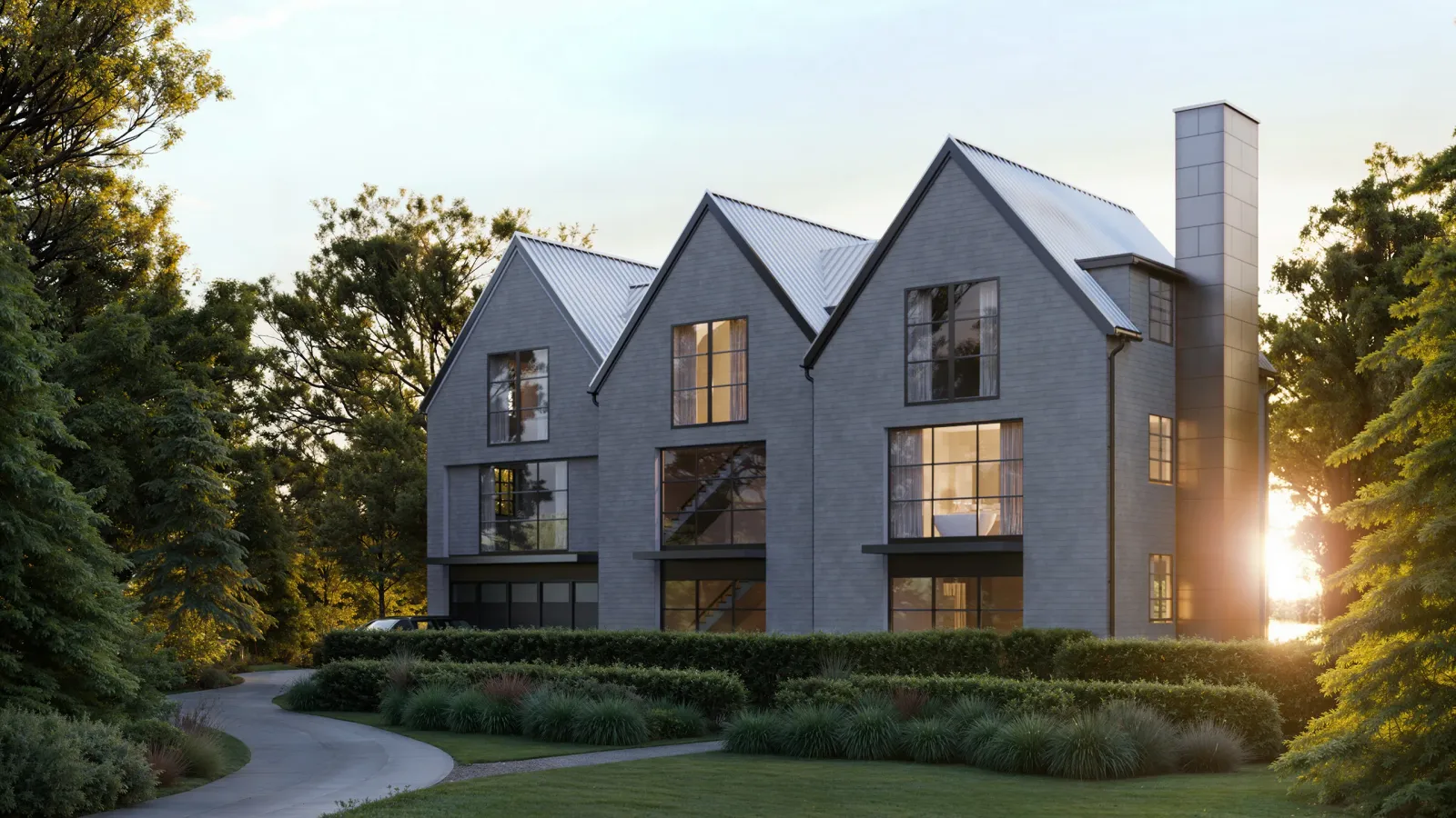 3366 Harness Creek custom home in Annapolis at sunset with gables, chimney and curving path