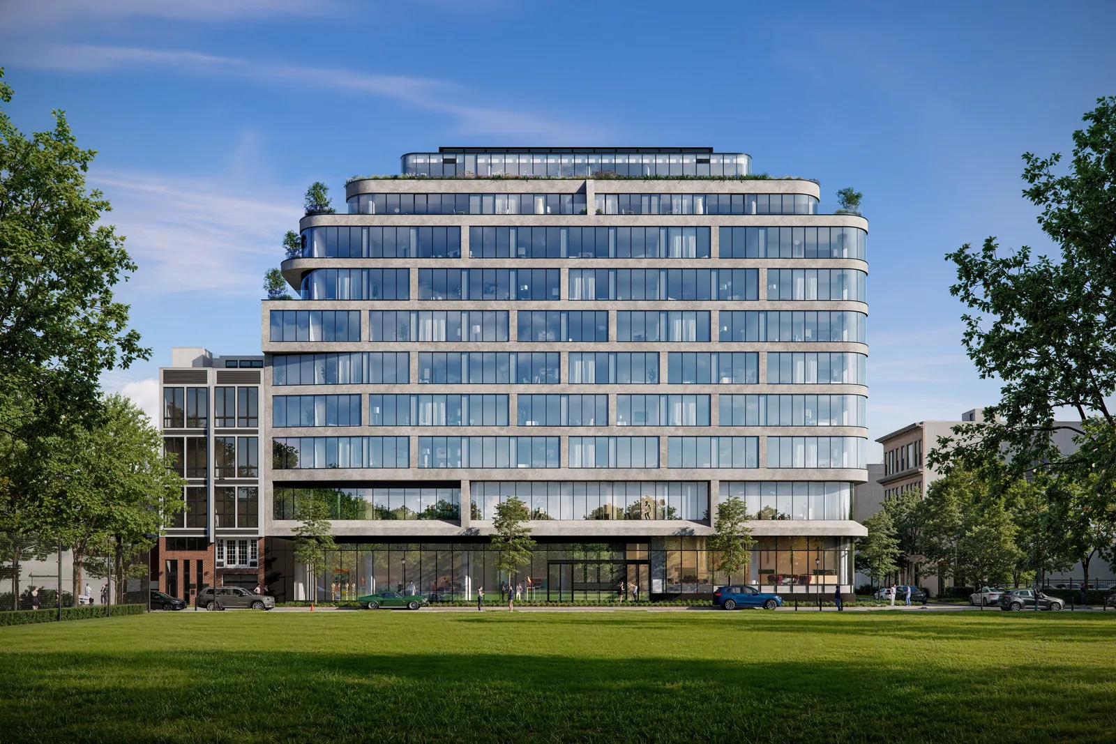Wide view of 387 8th Street in Jersey City with rounded glass floors and planted terraces
