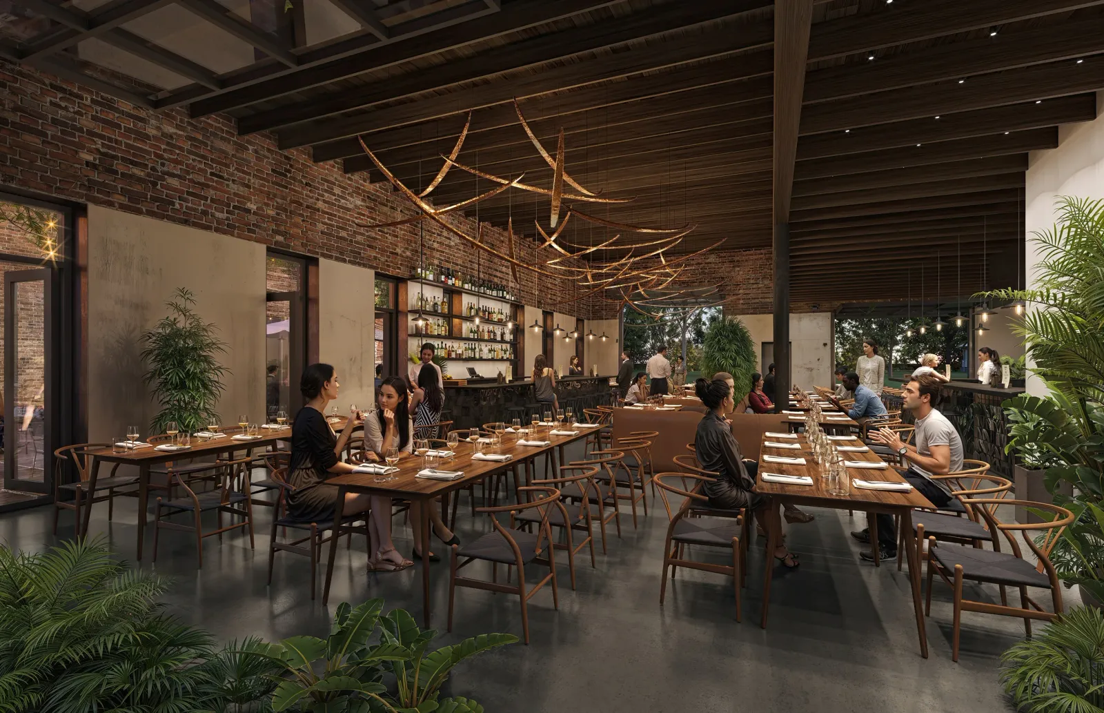 Restaurant with brick walls, timber ceiling and branch light sculpture at 614 E. Main St, Chattanooga