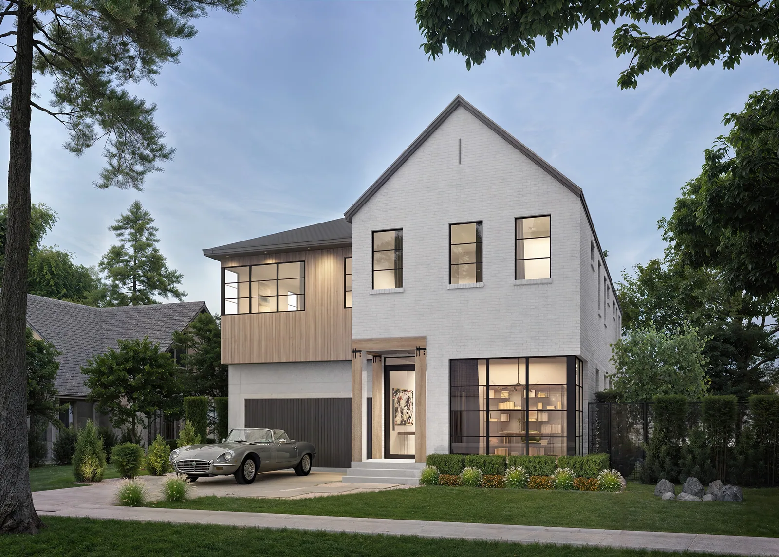 White brick and wood-clad custom home at 6542 Sewanee Ave in Houston with a classic car in the drive