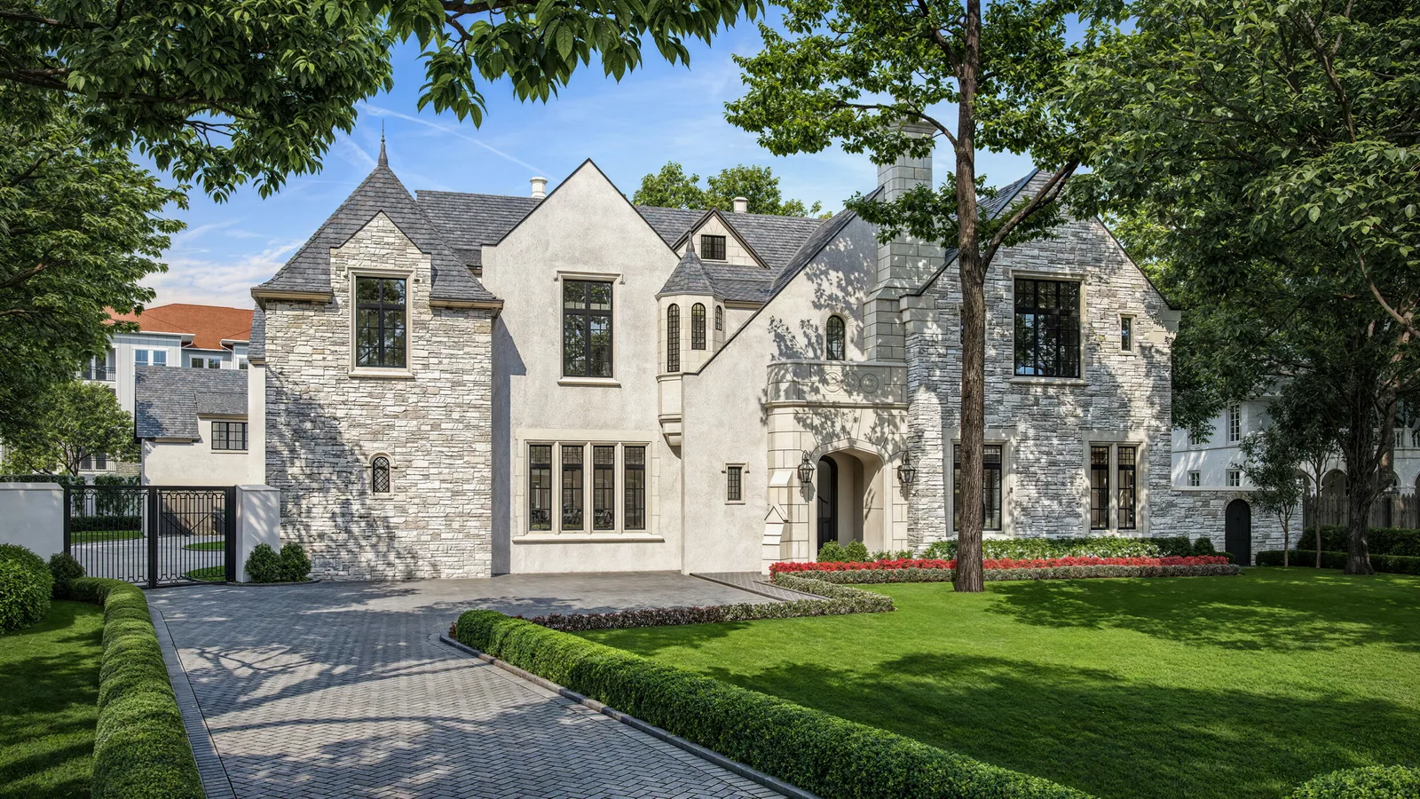 Limestone and stucco Tudor-style custom home at 842 Friar Tuck in Houston with paved front court