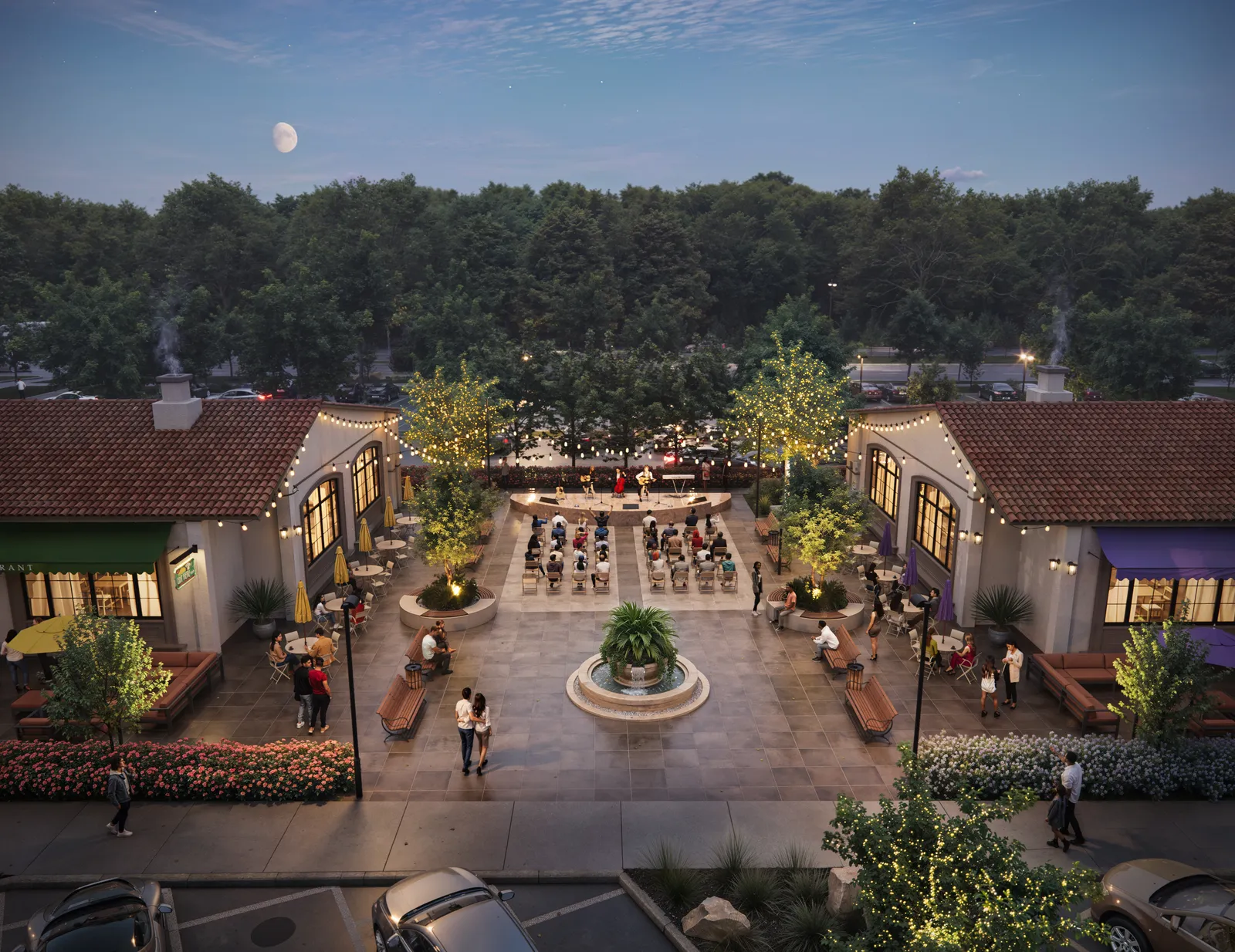 Paved courtyard with outdoor dining between tile-roofed buildings at dusk in Lakeside Village, Texas