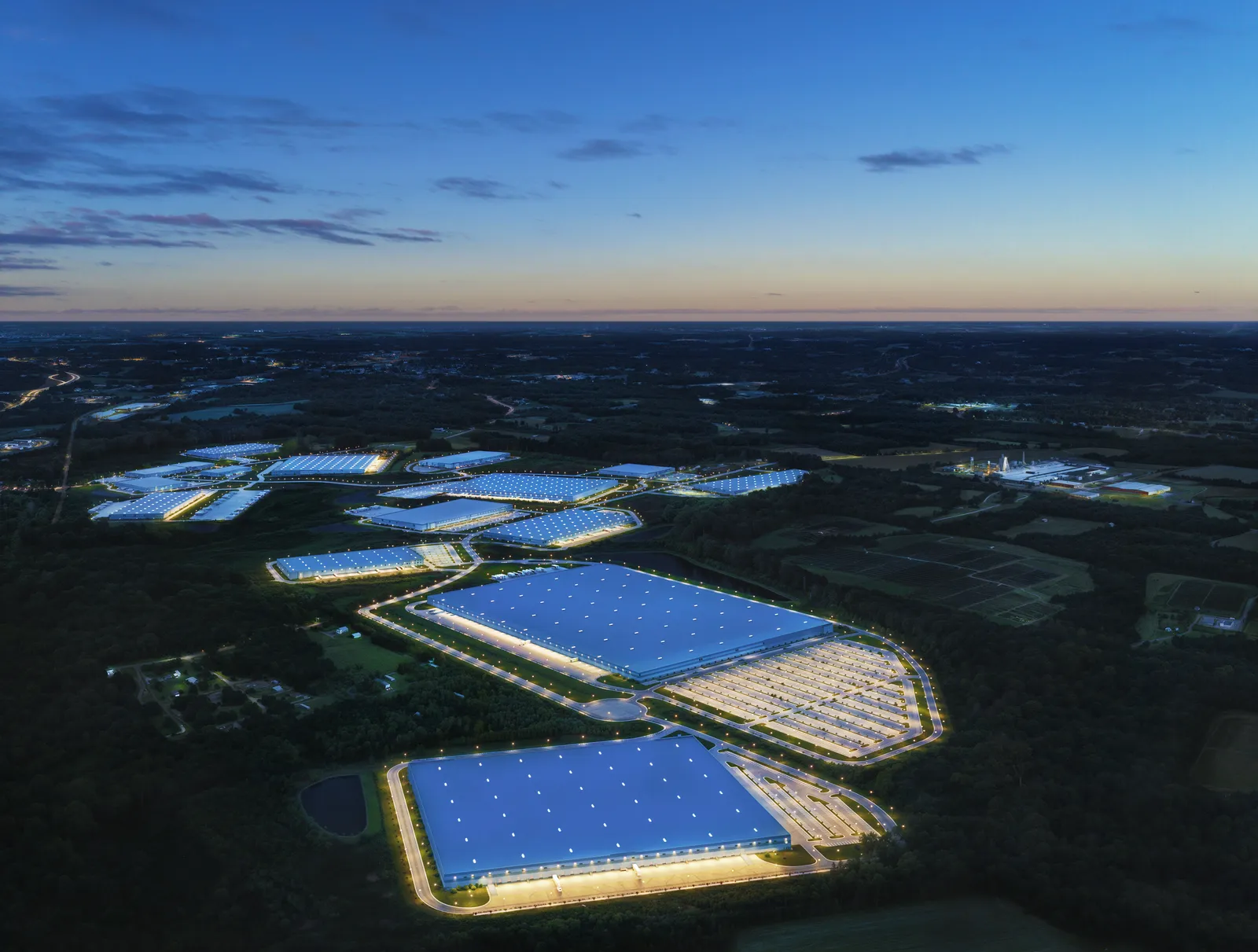Twilight aerial of the Carolina Corridor Industrial Center campus beside I-85 in Lexington, NC