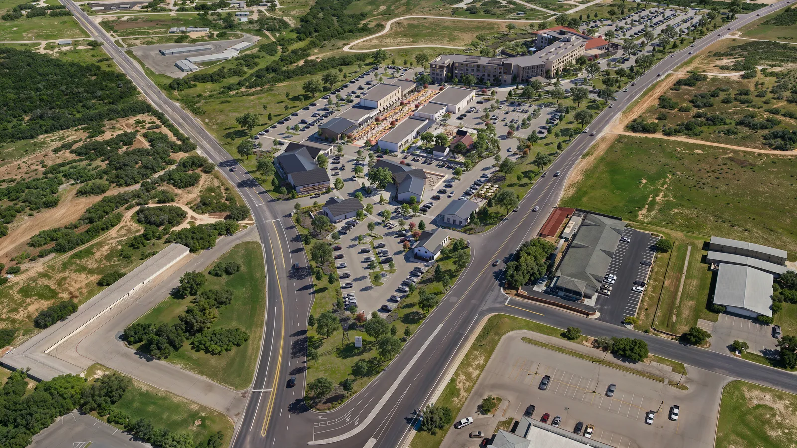 High aerial of The Meuse district and its roads in the Texas Hill Country near Fredericksburg
