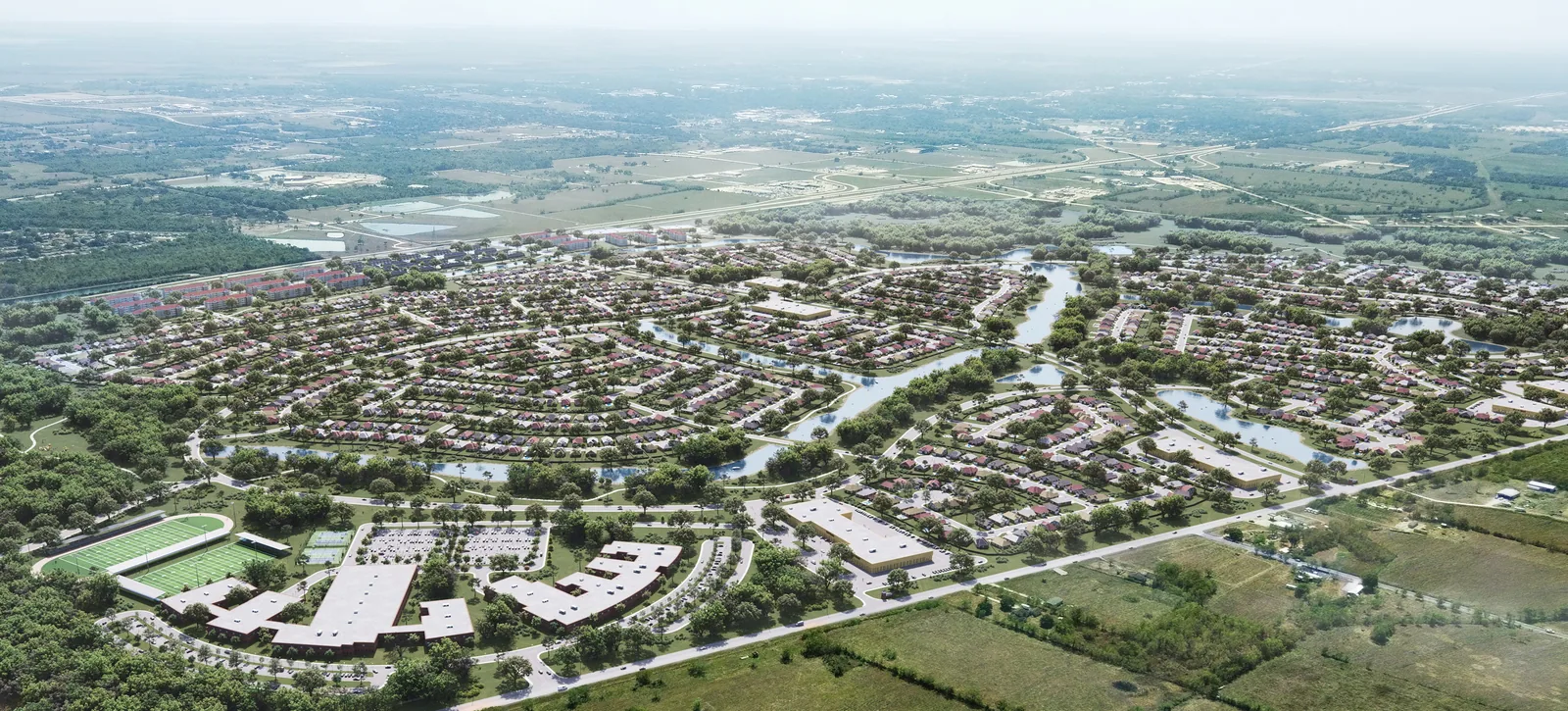 Aerial of the Ashland master-planned community in Texas with lakes, parks and an amenity center