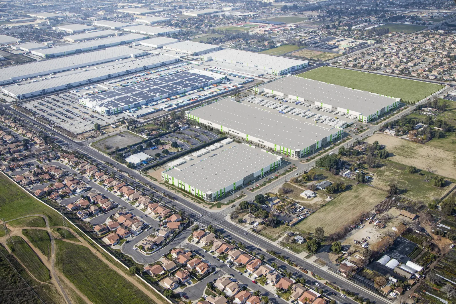 Aerial of Goodman Logistics Center Fontana buildings among neighborhoods in Fontana, California