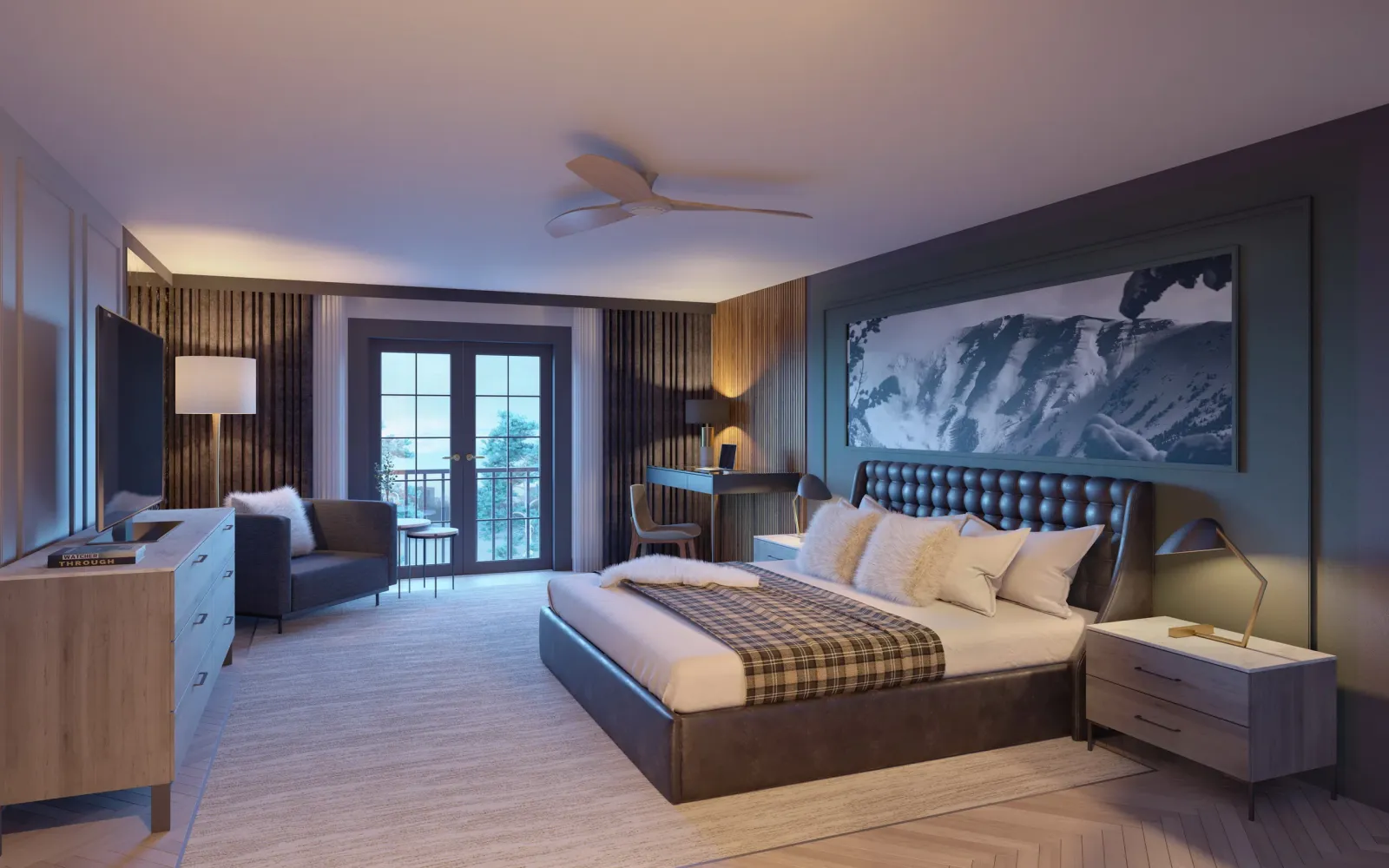 Guest room with tufted headboard, plaid throw and mountain mural at Gravity Haus