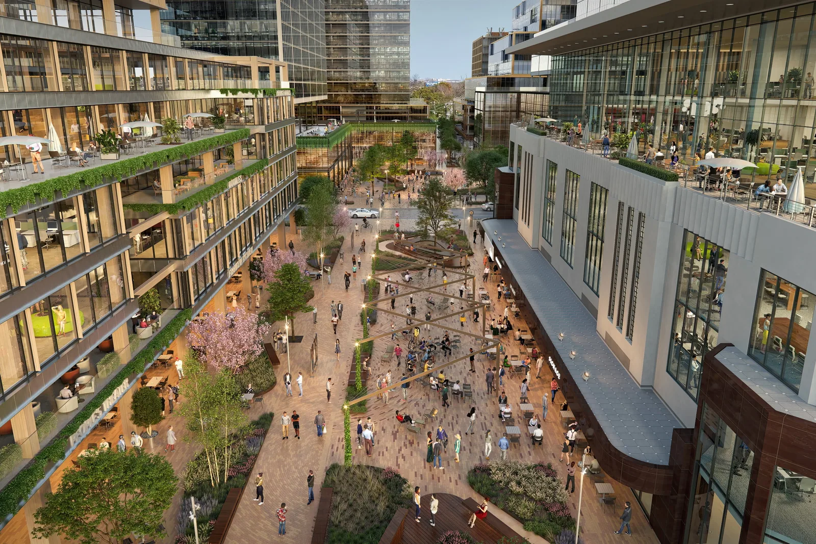 Aerial of a crowded central paseo between terraced buildings in Houston's The Ion