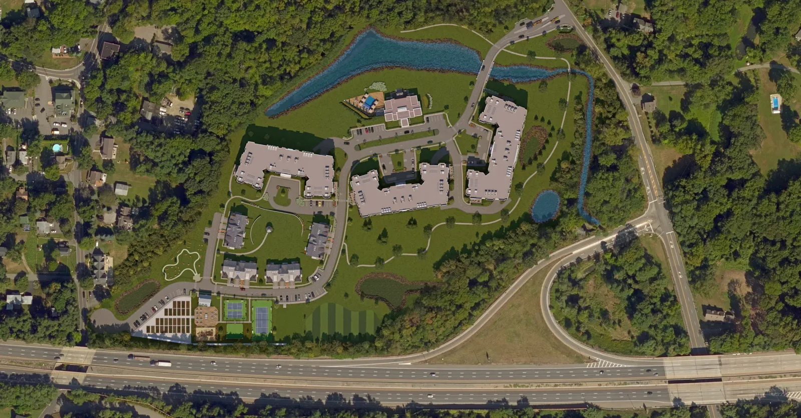 Aerial of Brookside at Montville in New Jersey with apartment buildings, clubhouse, pond and courts