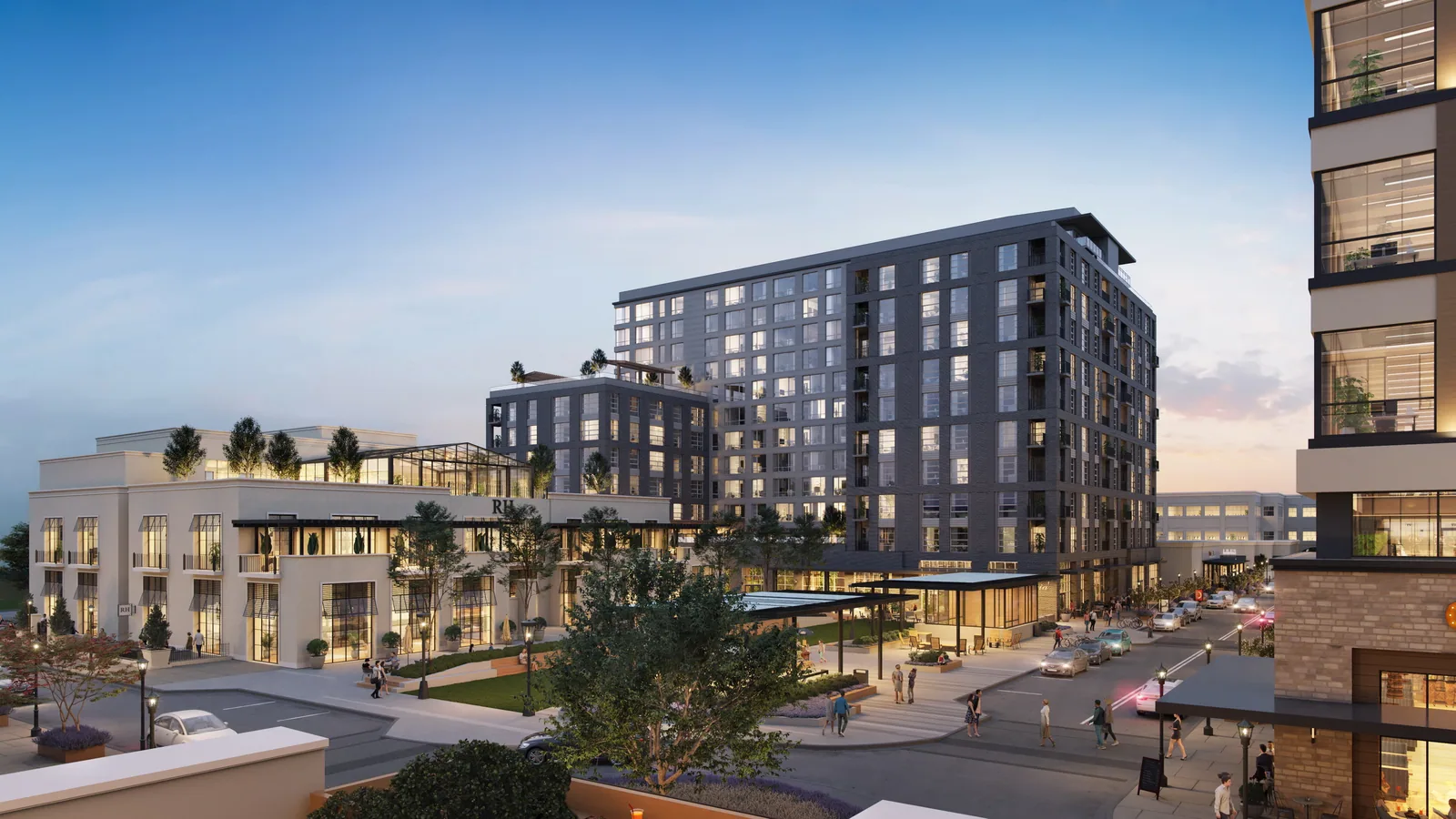 Elevated view of NHX buildings, roof terraces and street at dusk in Raleigh