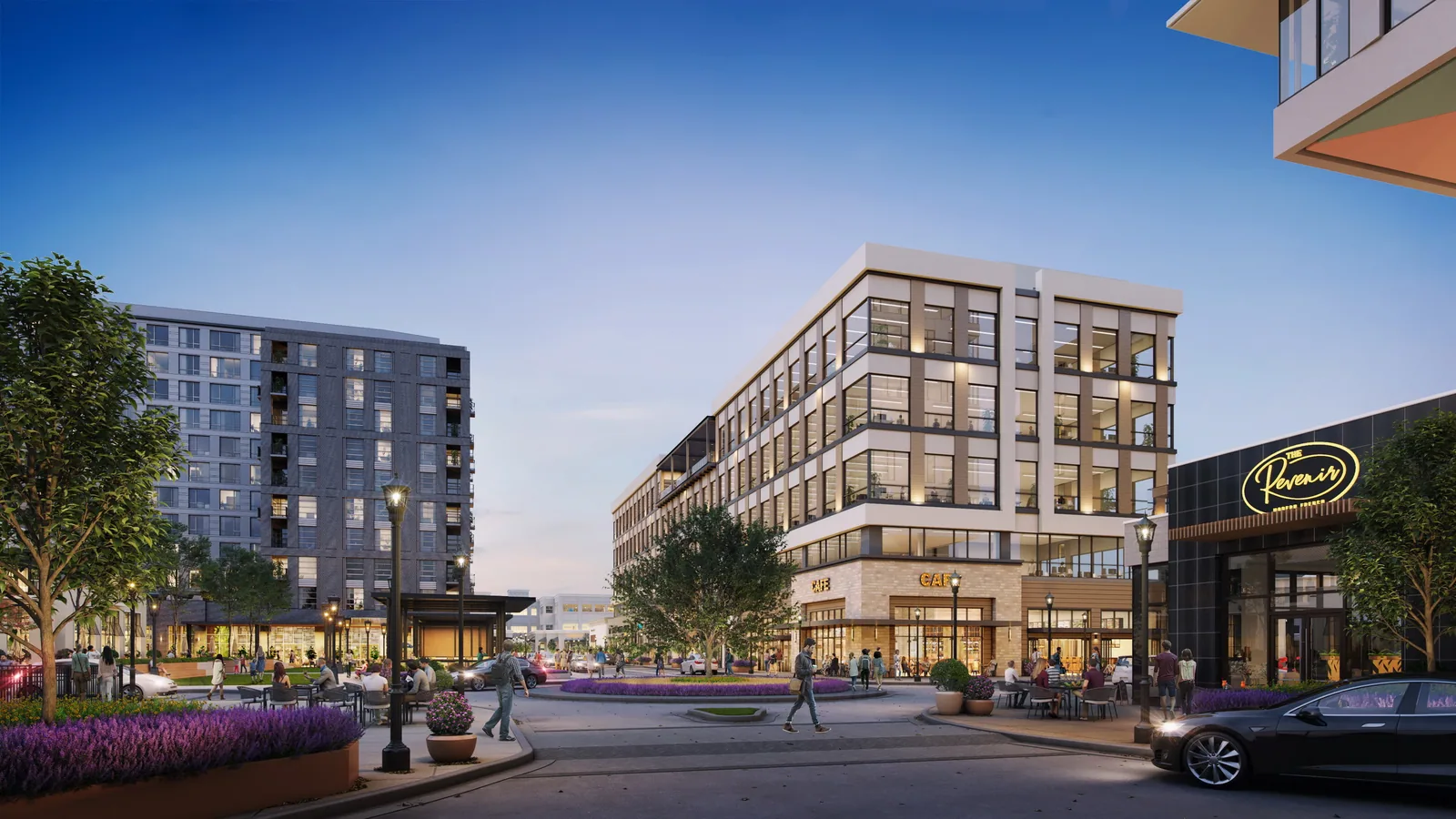 Plaza with shops, restaurant and office buildings at NHX in Raleigh at dusk
