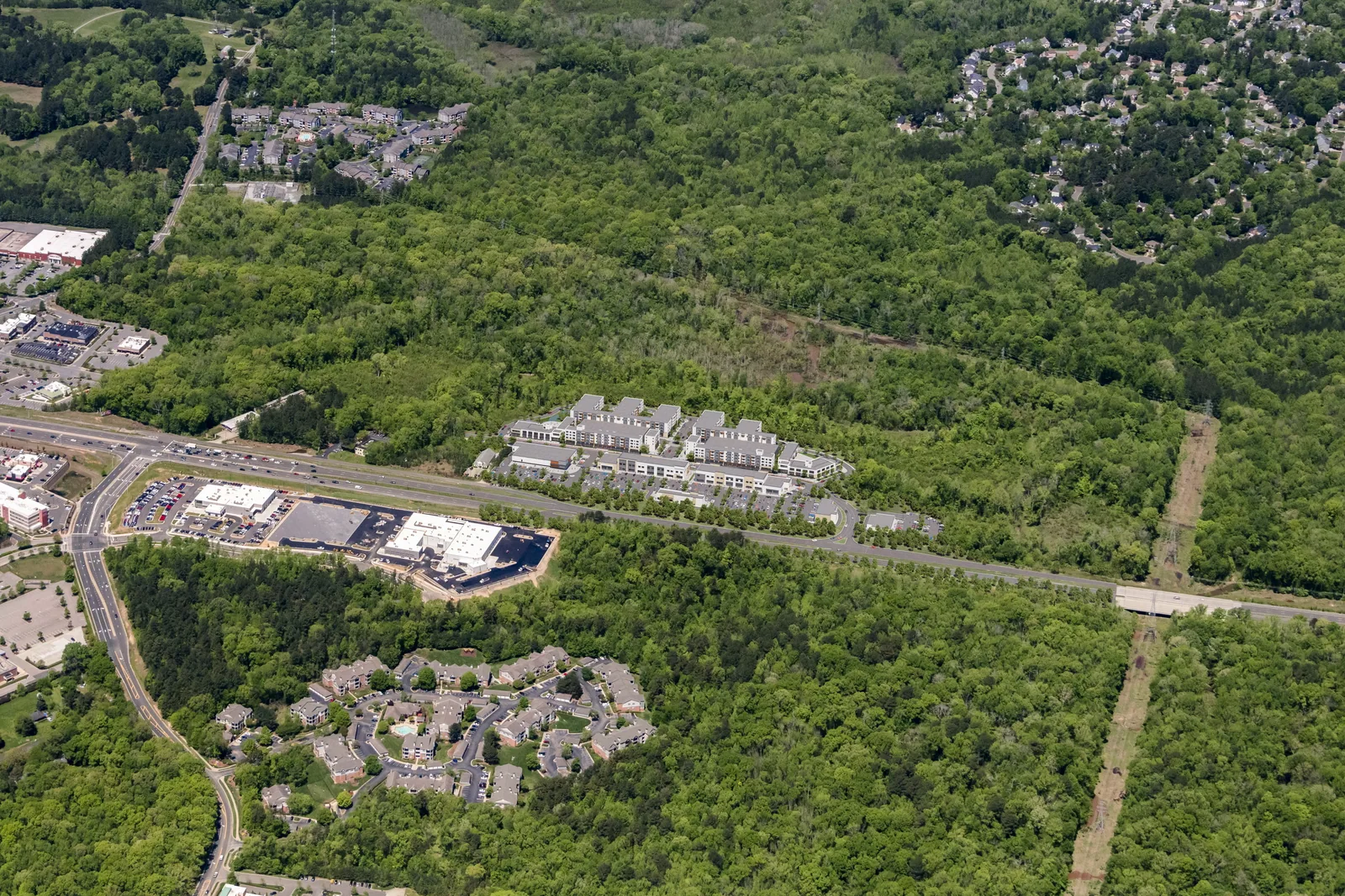 Aerial of the Oakridge residential plan in Durham, NC, with housing clusters in forest