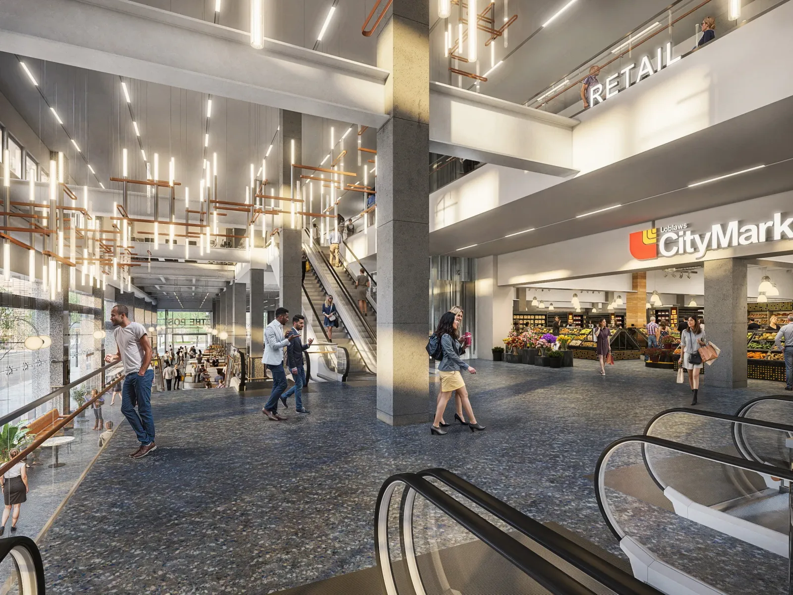 Concourse with grocery entrance, escalators and suspended lights at The Post, Vancouver