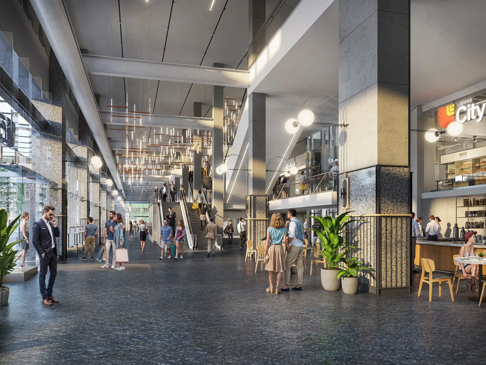 Long retail concourse with shops, cafe seating and globe lights at The Post in Vancouver