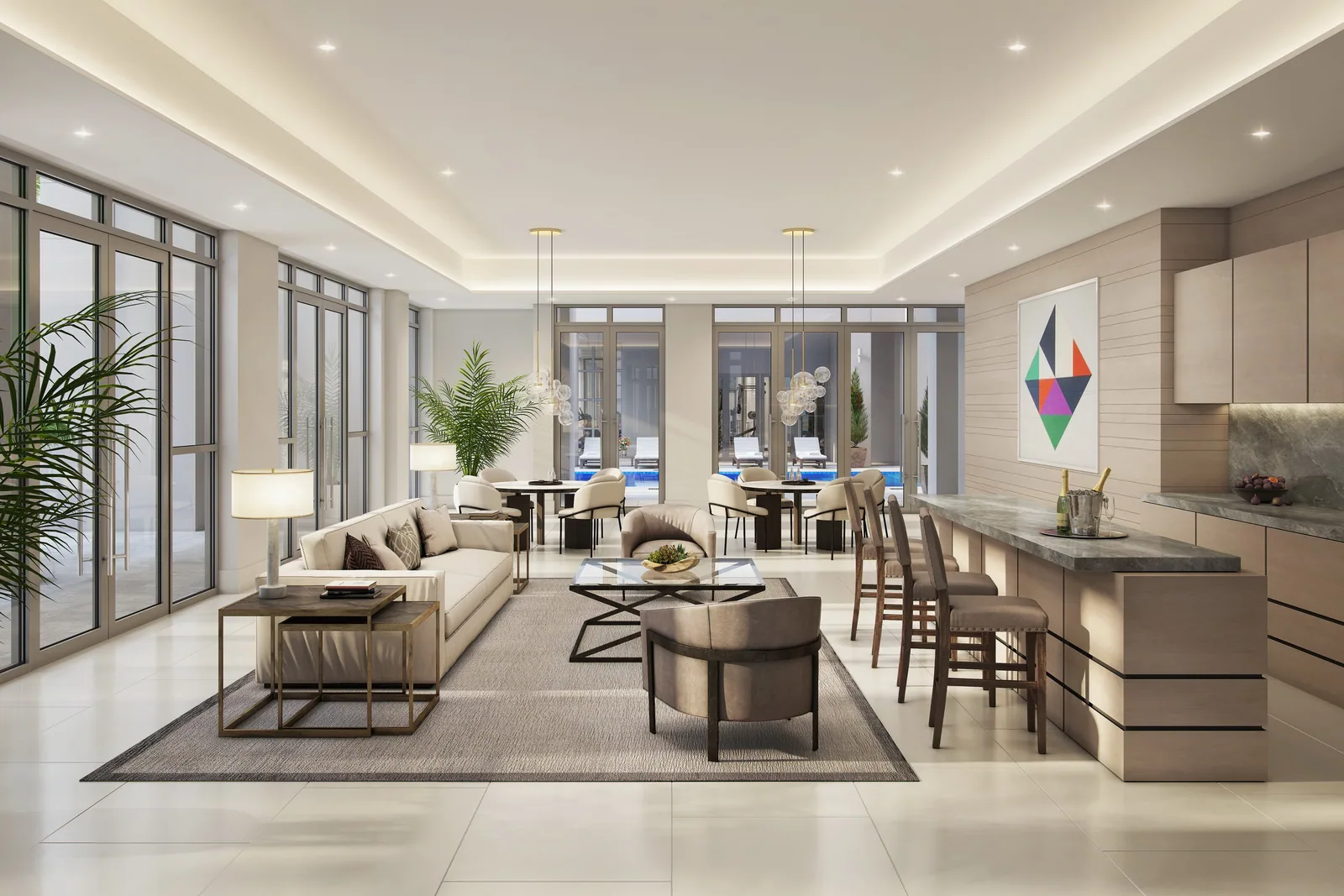 Open living room, kitchen and dining area with pool views at Royal Palm Residences in Boca Raton