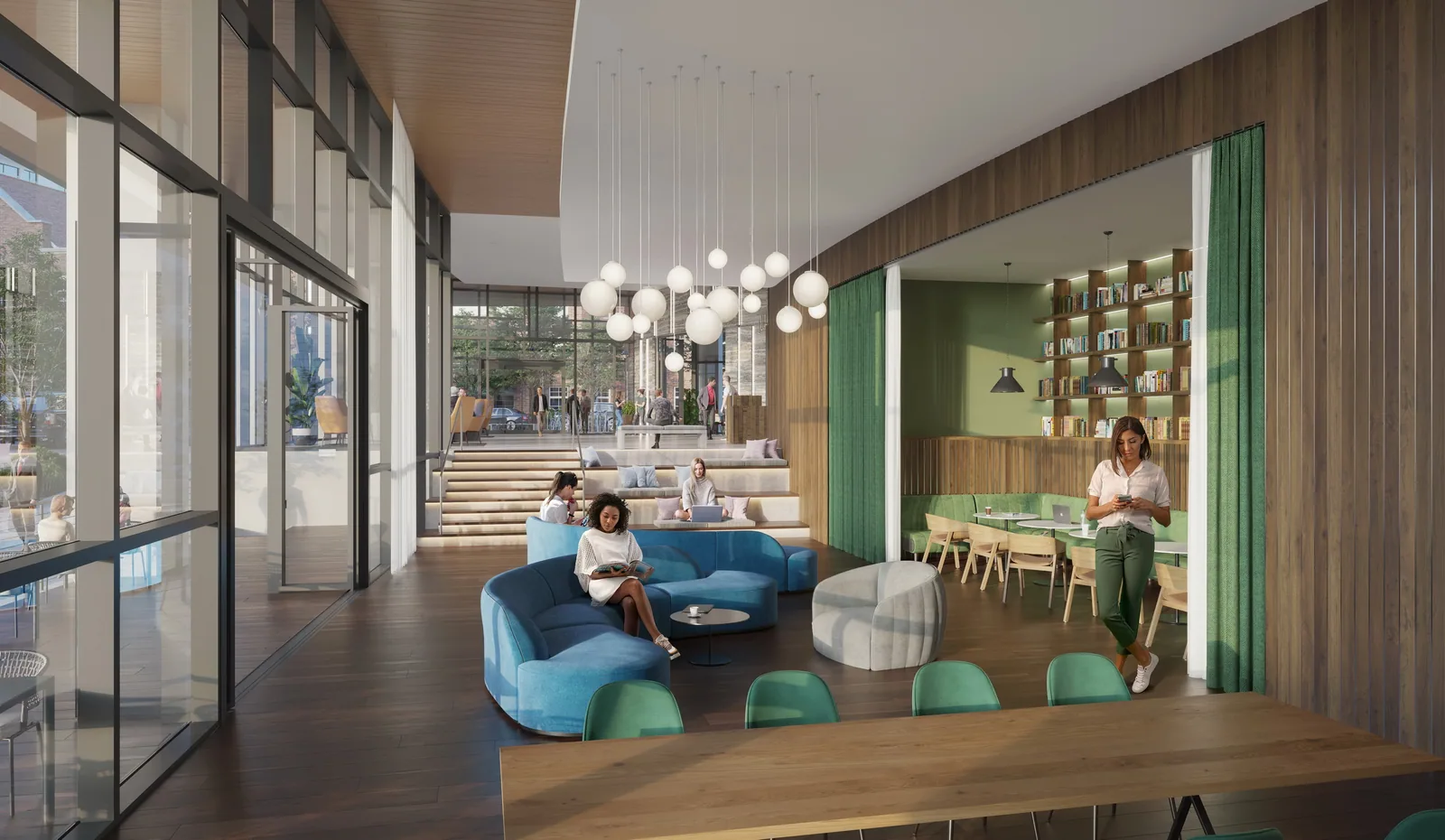Lobby lounge with blue sofa, globe pendants and library nook at Stratus Midtown, Atlanta