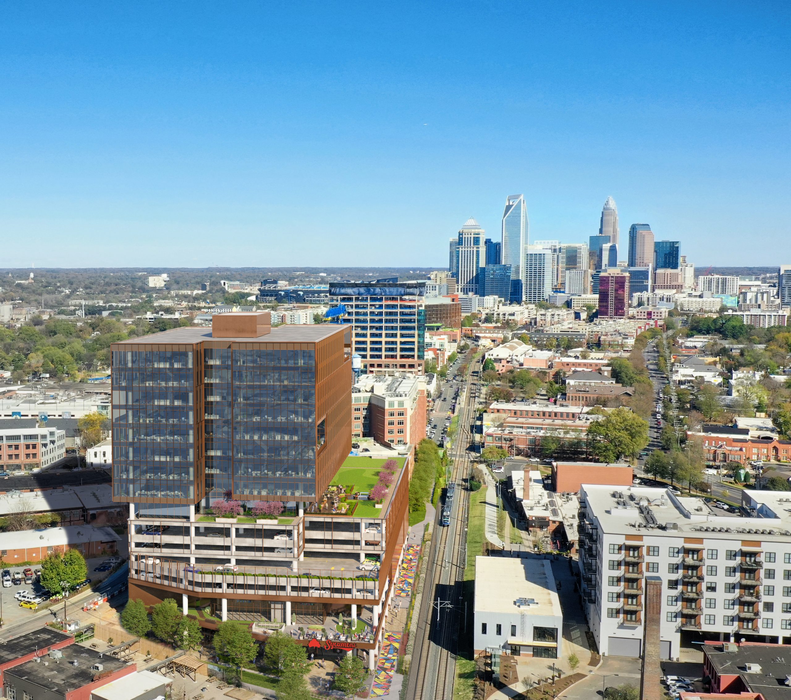 The Line 2151 Hawkins Charlotte skyline aerial photomontage rendering by Bogza.com. A bright daytime bird's-eye view integrating the modern 16-story glass and concrete office tower into the South End neighborhood, showcasing its proximity to the Rail Trail and offering a clear view of the towering Uptown Charlotte skyline.
