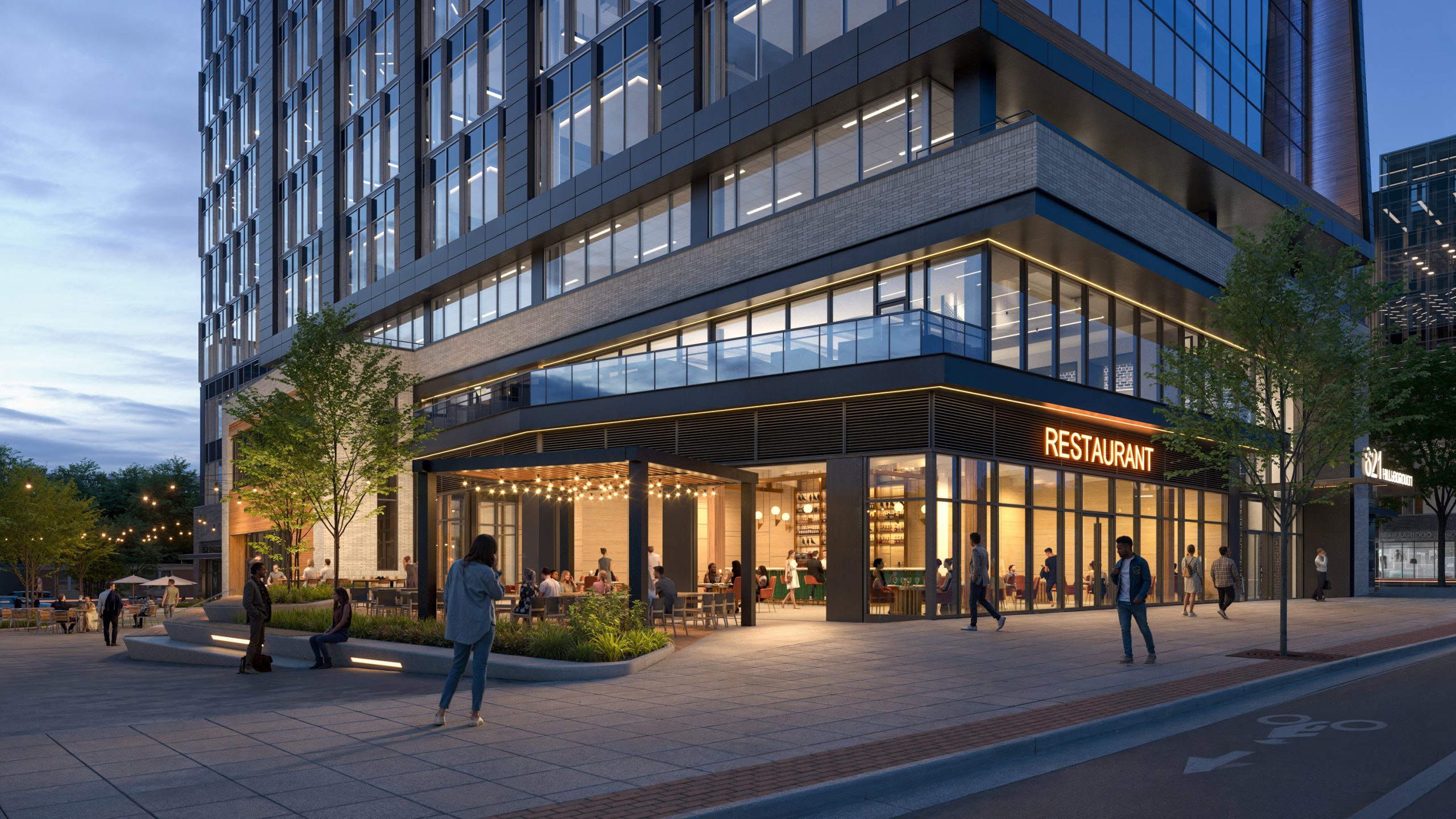 621 Hillsborough Raleigh retail exterior night rendering by Bogza.com. A stunning twilight view of Tower Two at Bloc 83's ground-floor commercial space, featuring a brightly illuminated restaurant with an outdoor dining patio, glowing string lights, and pedestrians enjoying the evening.