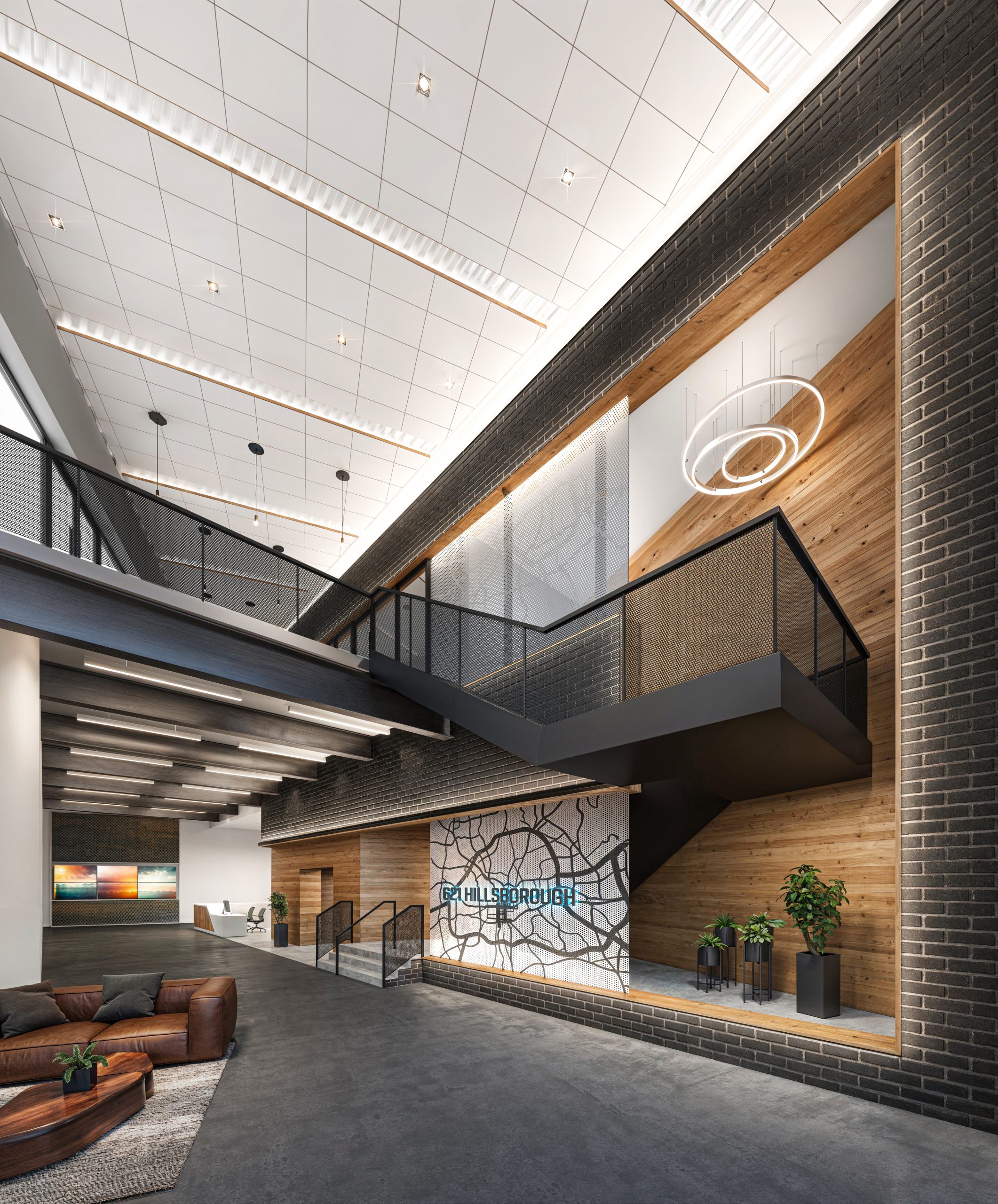 621 Hillsborough Raleigh luxury office lobby interior rendering by Bogza.com. A grand, modern reception space featuring dark brick walls, warm wood paneling, a sleek black staircase, comfortable leather lounge seating, and a striking illuminated 621 Hillsborough map graphic.