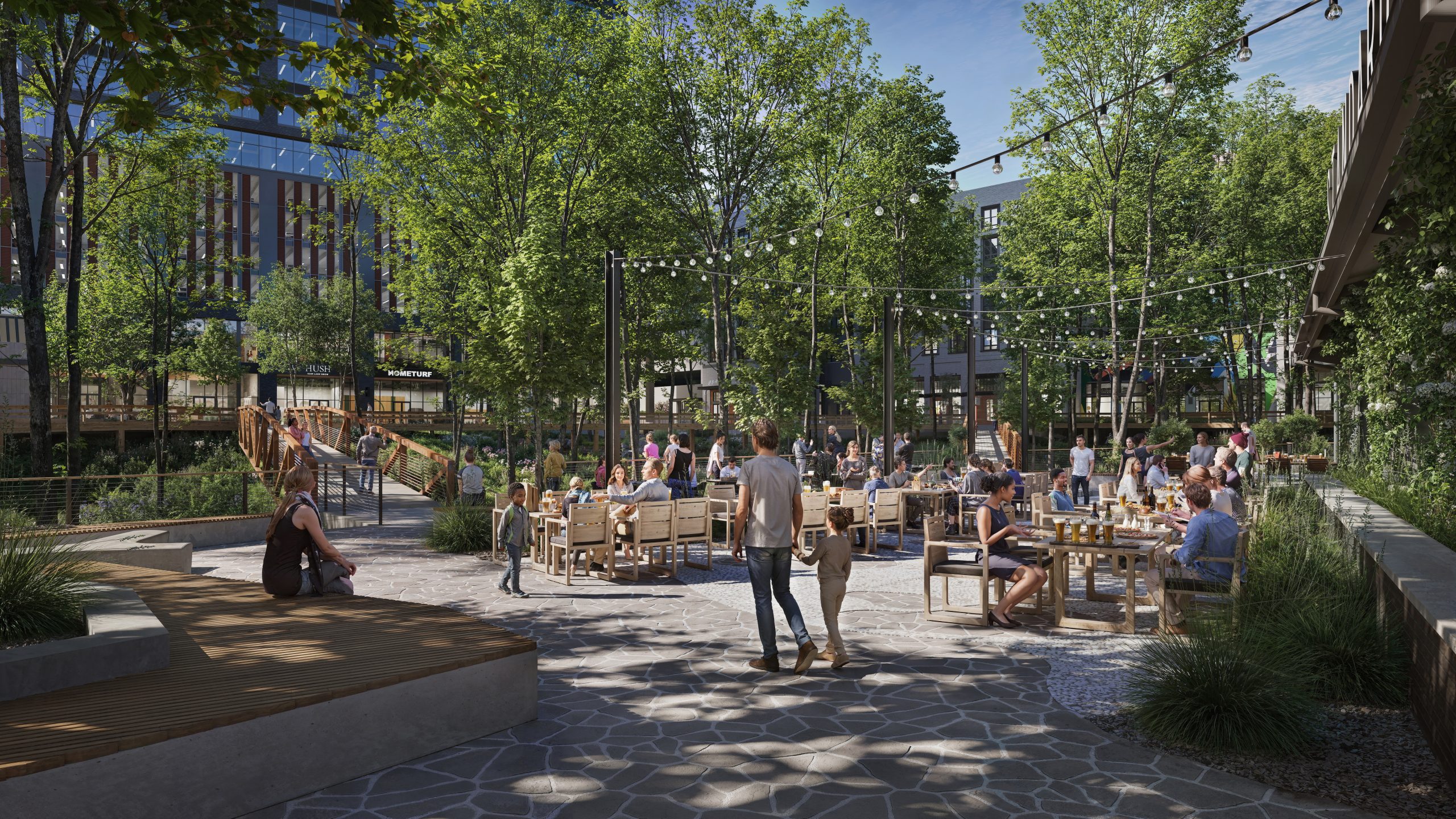 North Hills Innovation District NHID Raleigh outdoor patio rendering by Bogza.com. A lively daytime view of the mixed-use community's gathering spaces, showcasing residents enjoying an outdoor beer garden with string lights, adjacent to retail storefronts like HomeTurf and a pedestrian bridge.