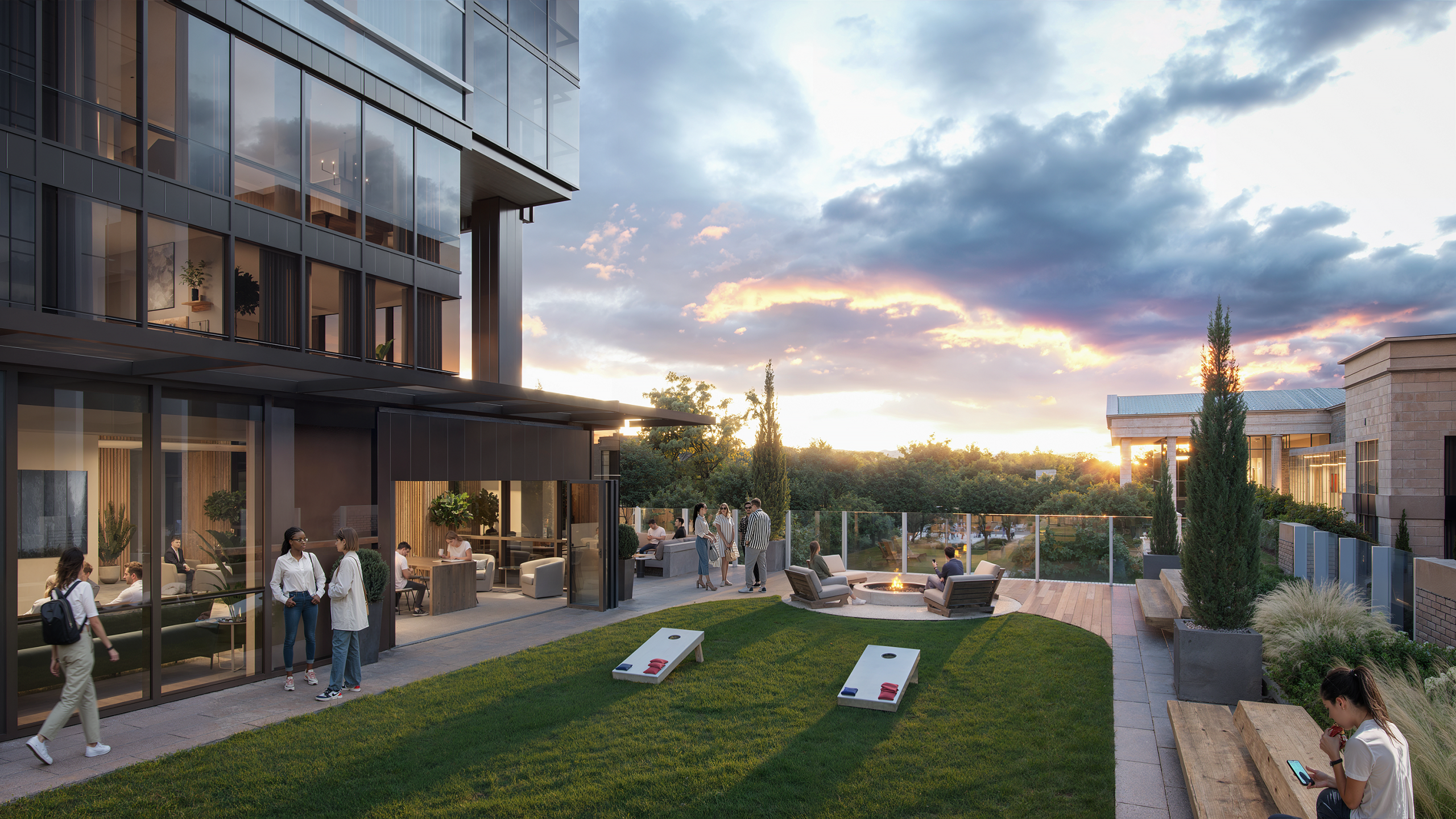 Salisbury Square Raleigh outdoor amenity terrace rendering by Bogza.com. A stunning sunset view of the elevated sky deck, featuring a modern fire pit, comfortable lounge seating, a turf lawn with lawn games, and expansive views of the Raleigh tree canopy.