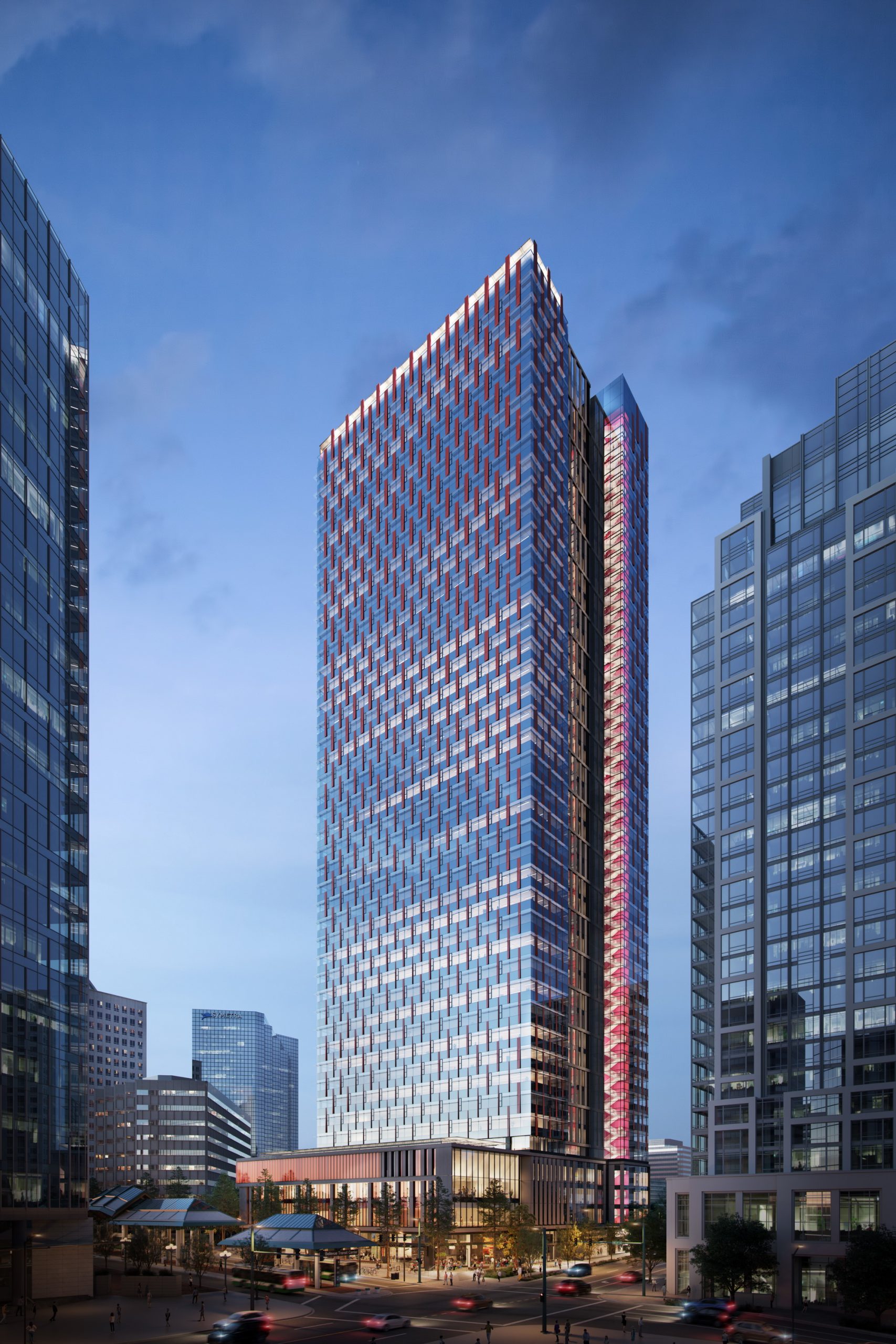 600 Bellevue downtown exterior architectural rendering by Bogza.com. A stunning dusk view of the modern high-rise office tower featuring sleek blue glass, striking red vertical accents, and a brightly illuminated transparent stairwell extending up the facade.