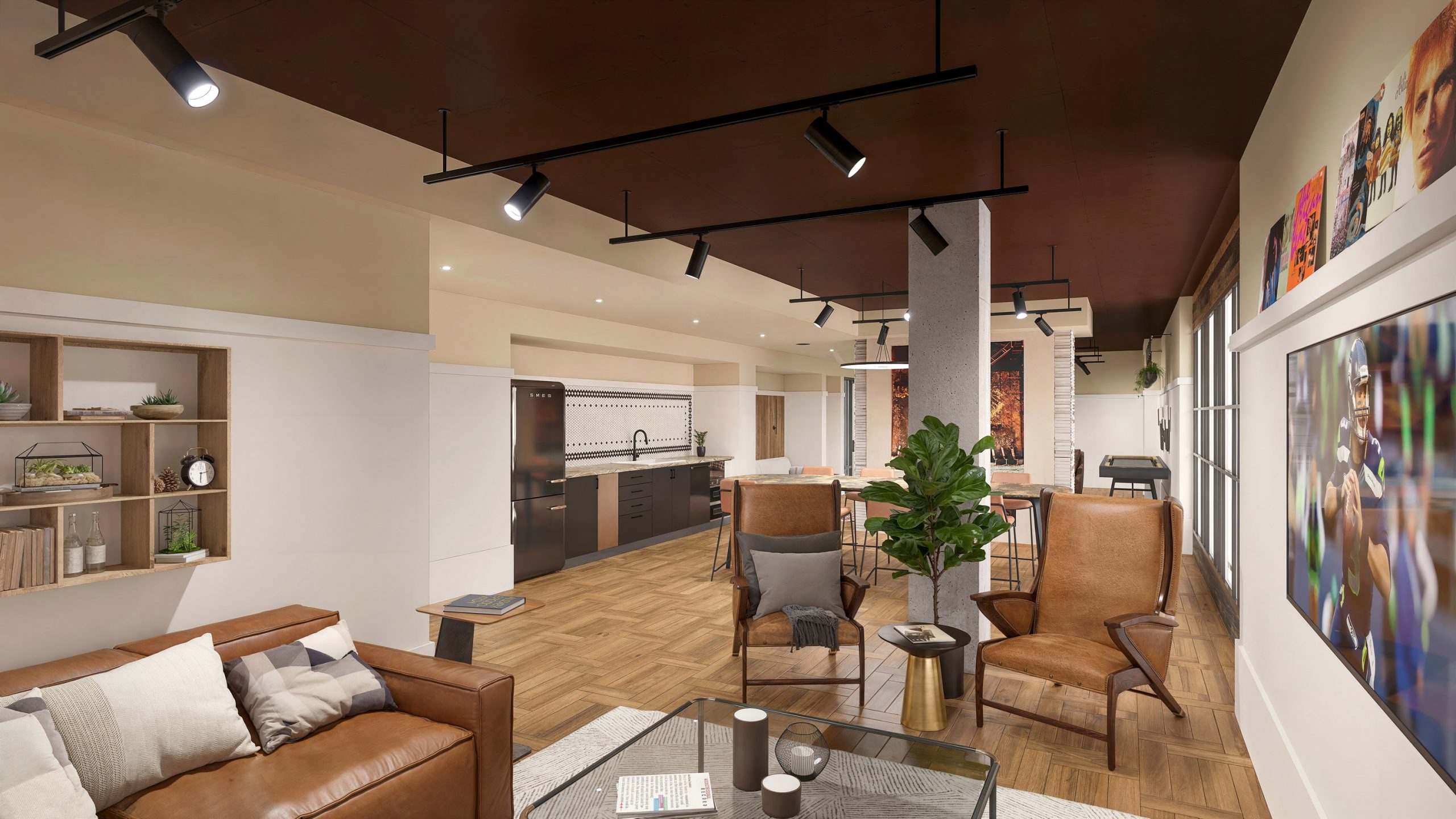 Ballard Yards Seattle resident lounge interior rendering by Bogza.com. A warm, inviting communal clubroom featuring an entertaining kitchen, industrial track lighting, leather armchairs, and a large TV screen.