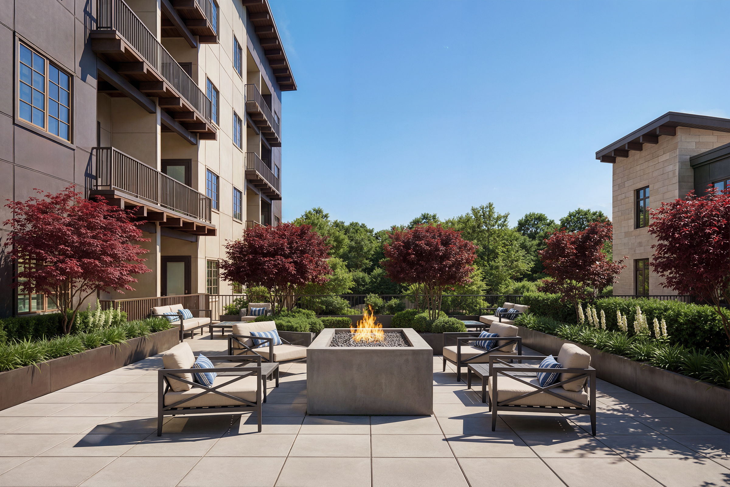 Bellevue Senior Living outdoor courtyard architectural rendering by Bogza.com. A daytime view of the luxury retirement community's landscaped terrace, featuring a modern square fire pit, comfortable lounge seating, red Japanese maple trees, and lush greenery.