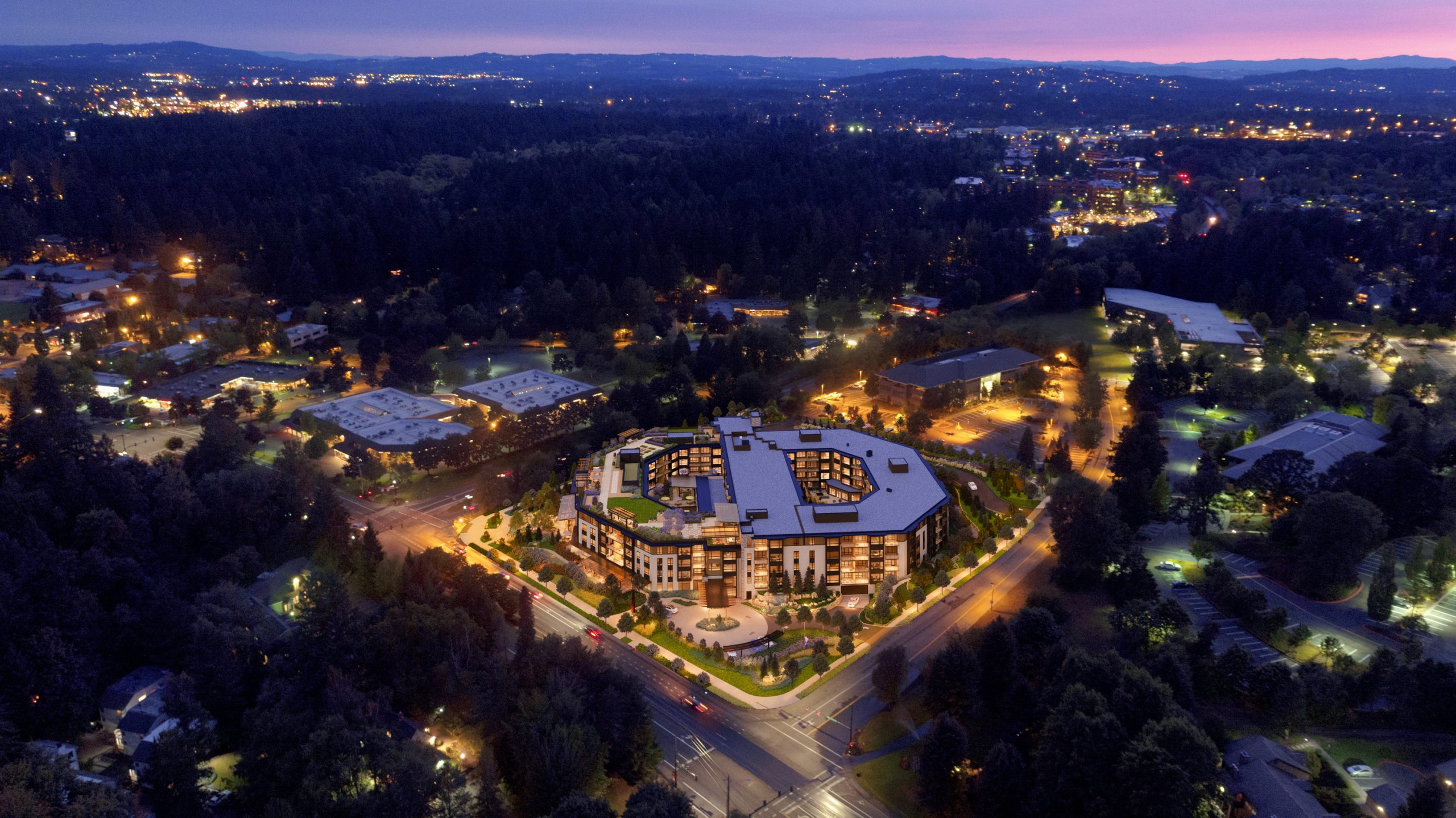 The Springs at Lake Oswego twilight aerial architectural rendering by Bogza.com. An elevated evening view of the luxury senior living campus, showcasing the glowing 5-story building, illuminated rooftop courtyards, and the surrounding forested neighborhood at dusk.