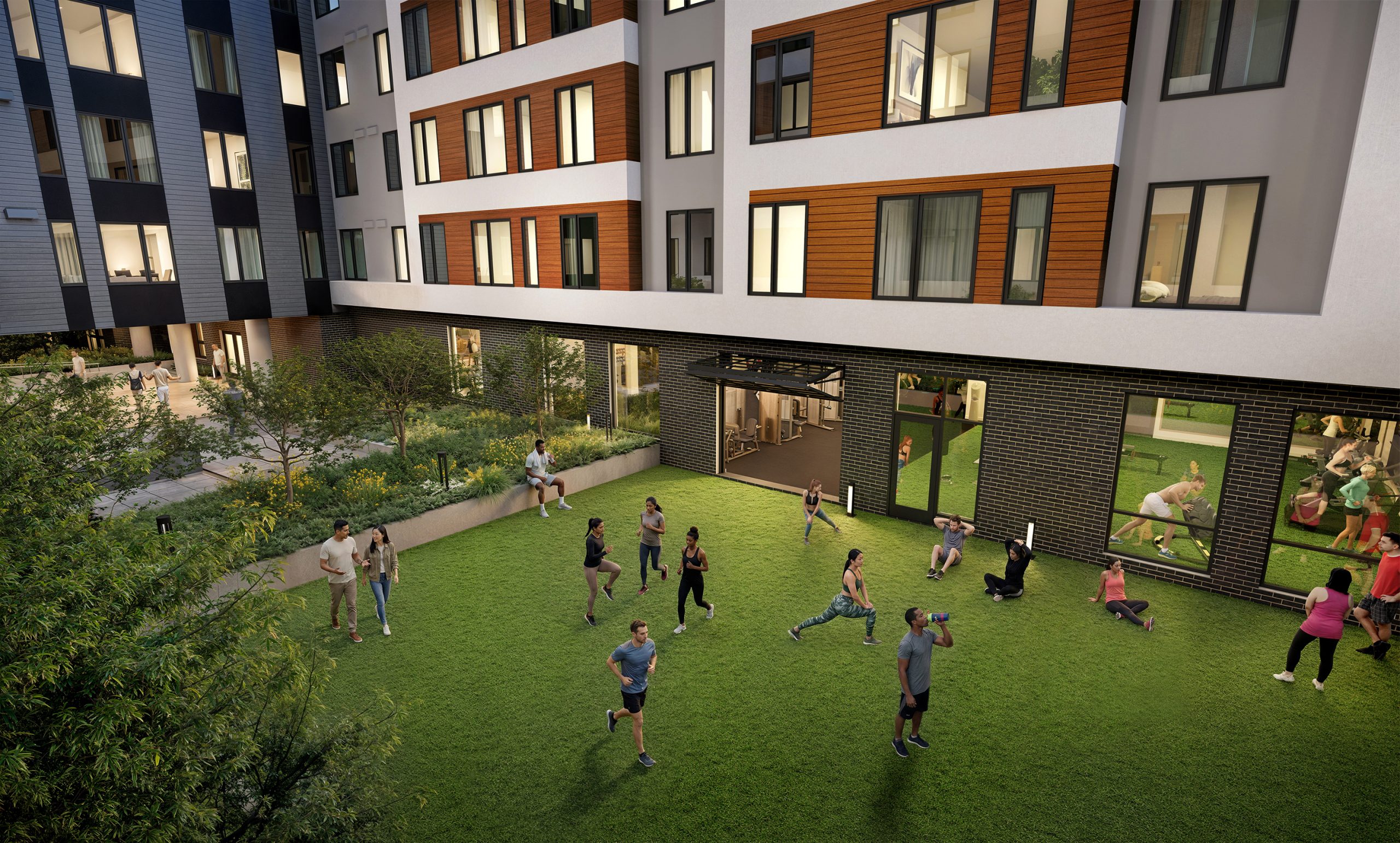 Trailside Student Living Seattle courtyard amenity rendering by Bogza.com. A dusk view of the community's internal courtyard featuring an expansive grass lawn where residents are exercising and stretching, adjacent to the illuminated ground-floor fitness center.