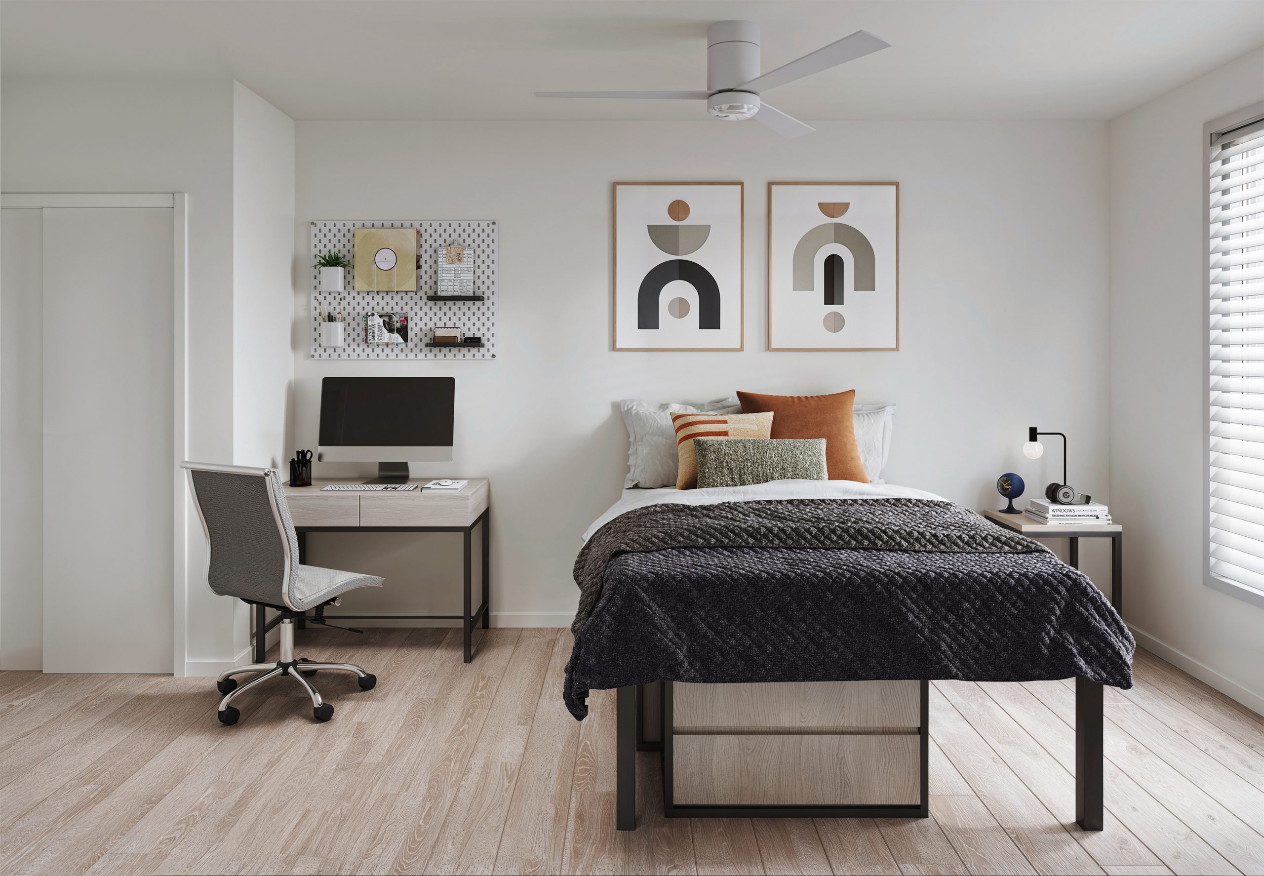 Trailside Student Living Seattle private bedroom interior rendering by Bogza.com. A bright, fully furnished student housing room featuring a comfortable bed, warm hardwood floors, a dedicated study desk with a chair, and a window with blinds.