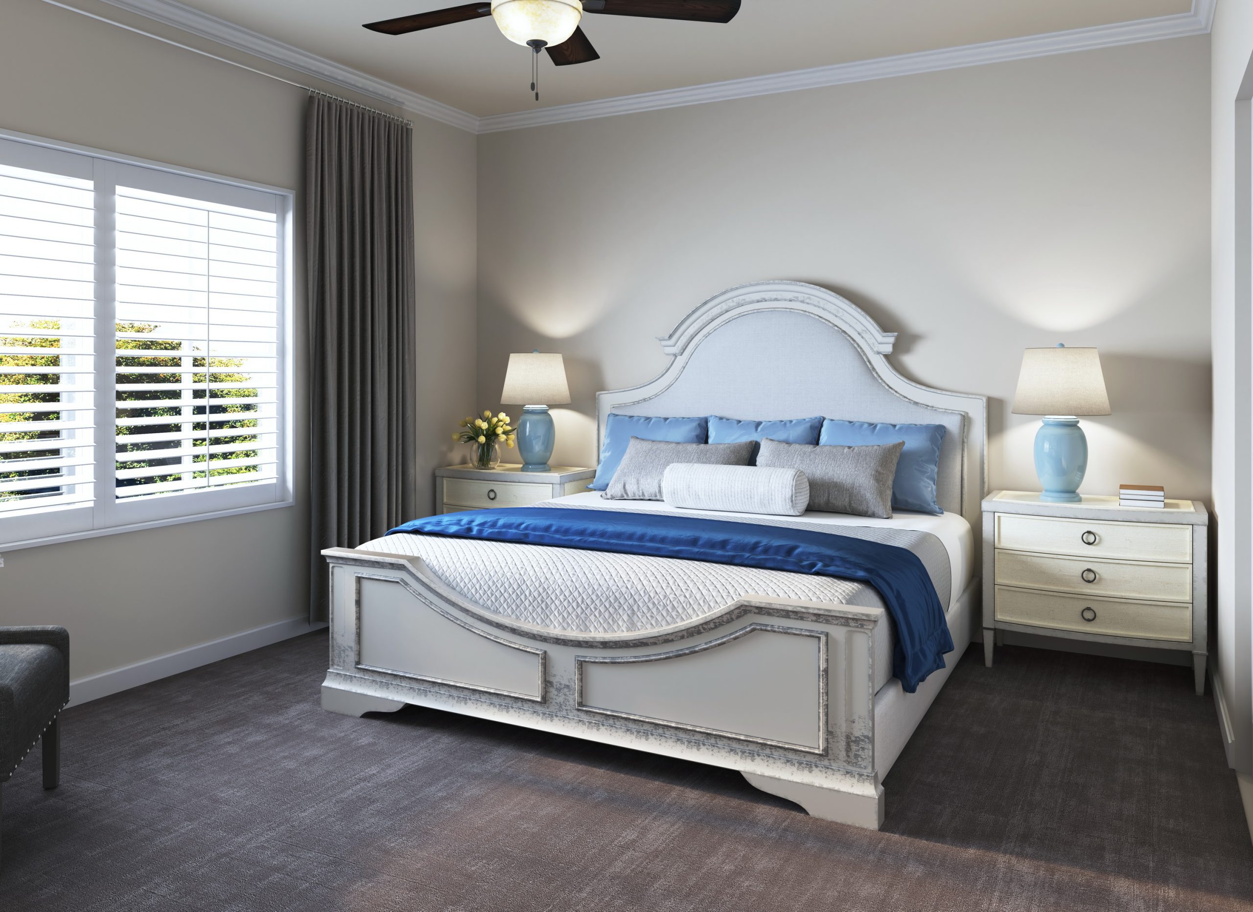 University Village retirement community apartment bedroom interior rendering by Bogza.com. A spacious, bright primary bedroom showcasing a classic white arched bed frame, light blue table lamps, elegant nightstands, and carpeted flooring.