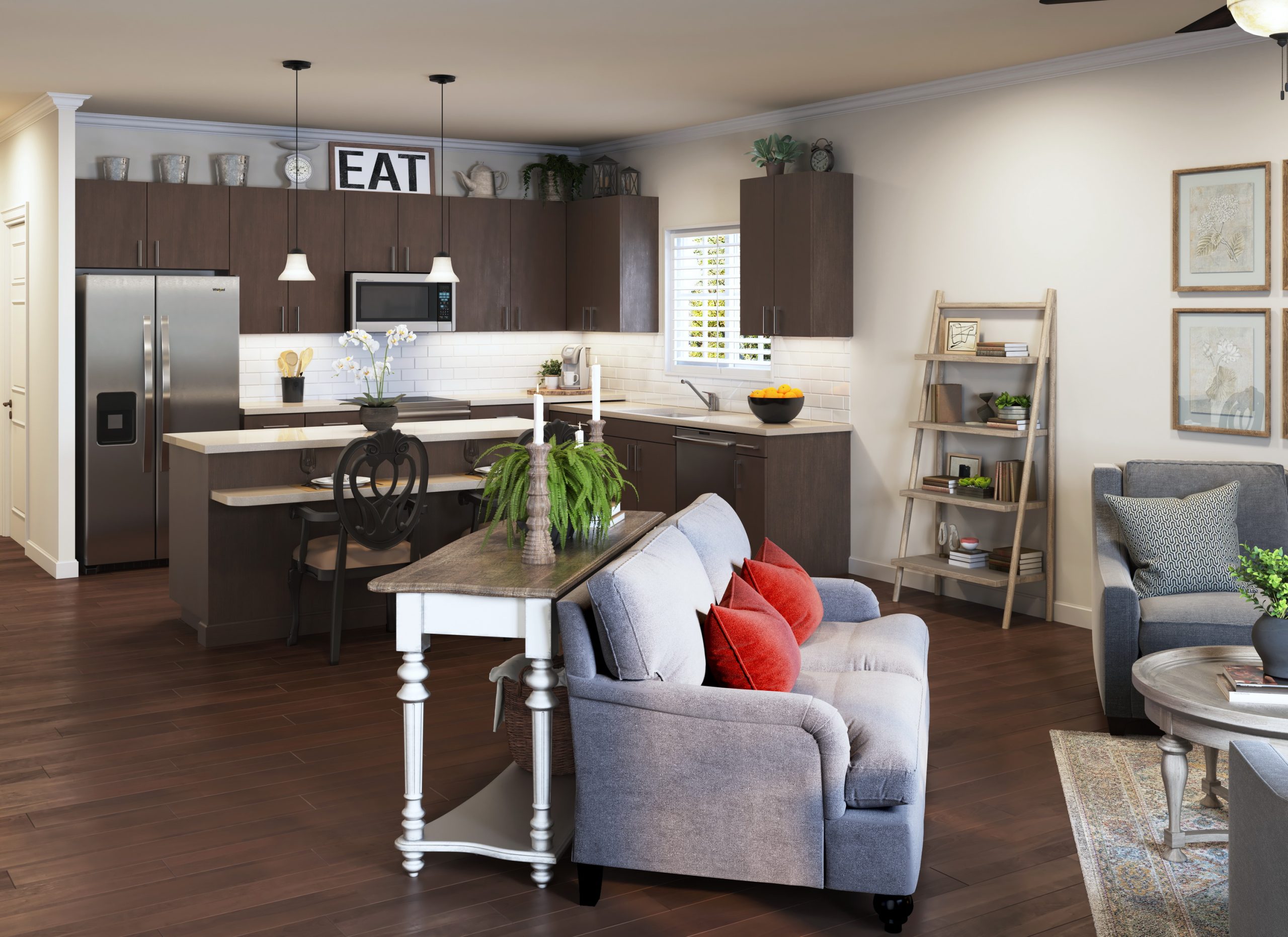 University Village senior living modern apartment kitchen interior rendering by Bogza.com. A stylish open-concept living space featuring a dark wood kitchen island with bar seating, white subway tile backsplash, stainless steel appliances, and a cozy adjacent lounge area.