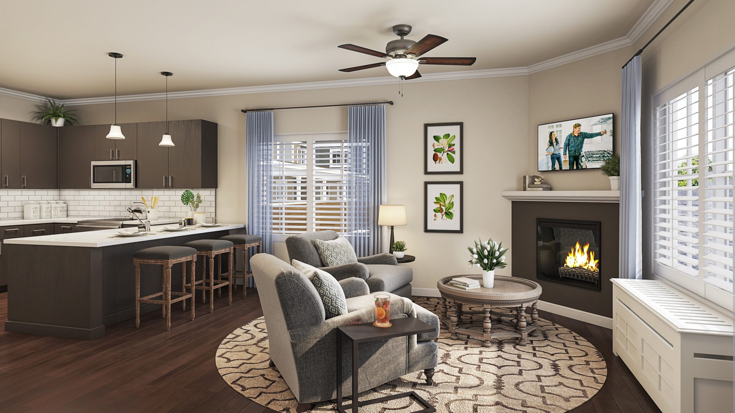 University Village luxury assisted living apartment interior rendering by Bogza.com. A bright, comfortable residence featuring a cozy lounge with grey armchairs, a warm fireplace with a TV, wood-style flooring, and a modern kitchenette with bar seating.